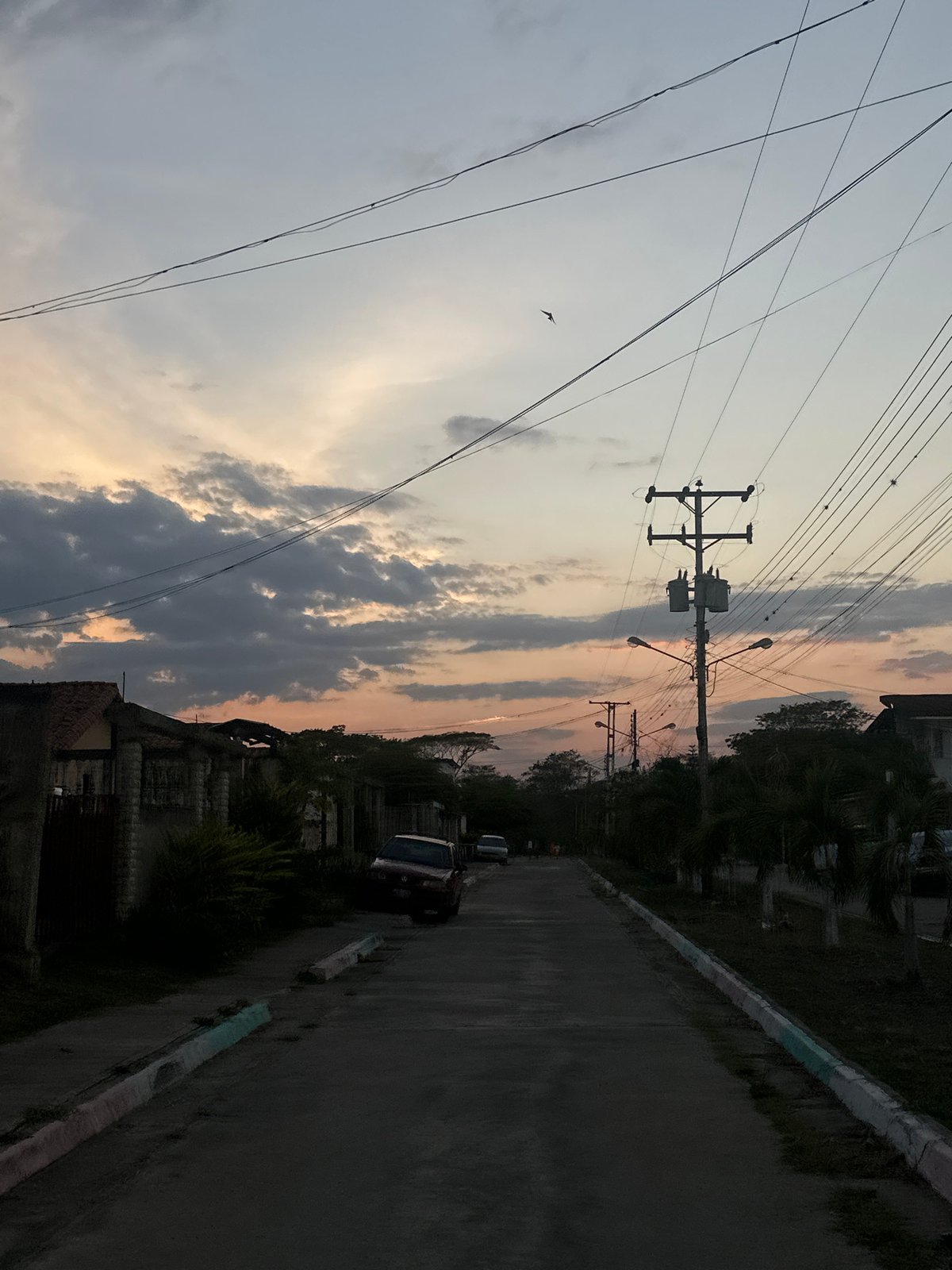 Evening street scene captured in Parroquia Ocumare, Venezuela