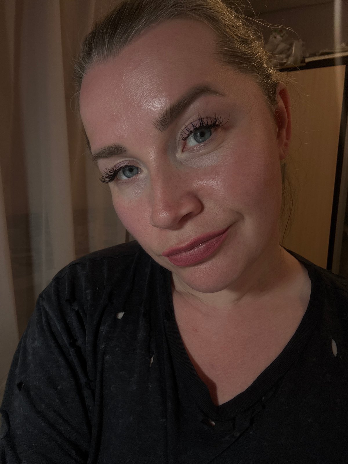 Woman documents dinner with selfies in Veliky Novgorod