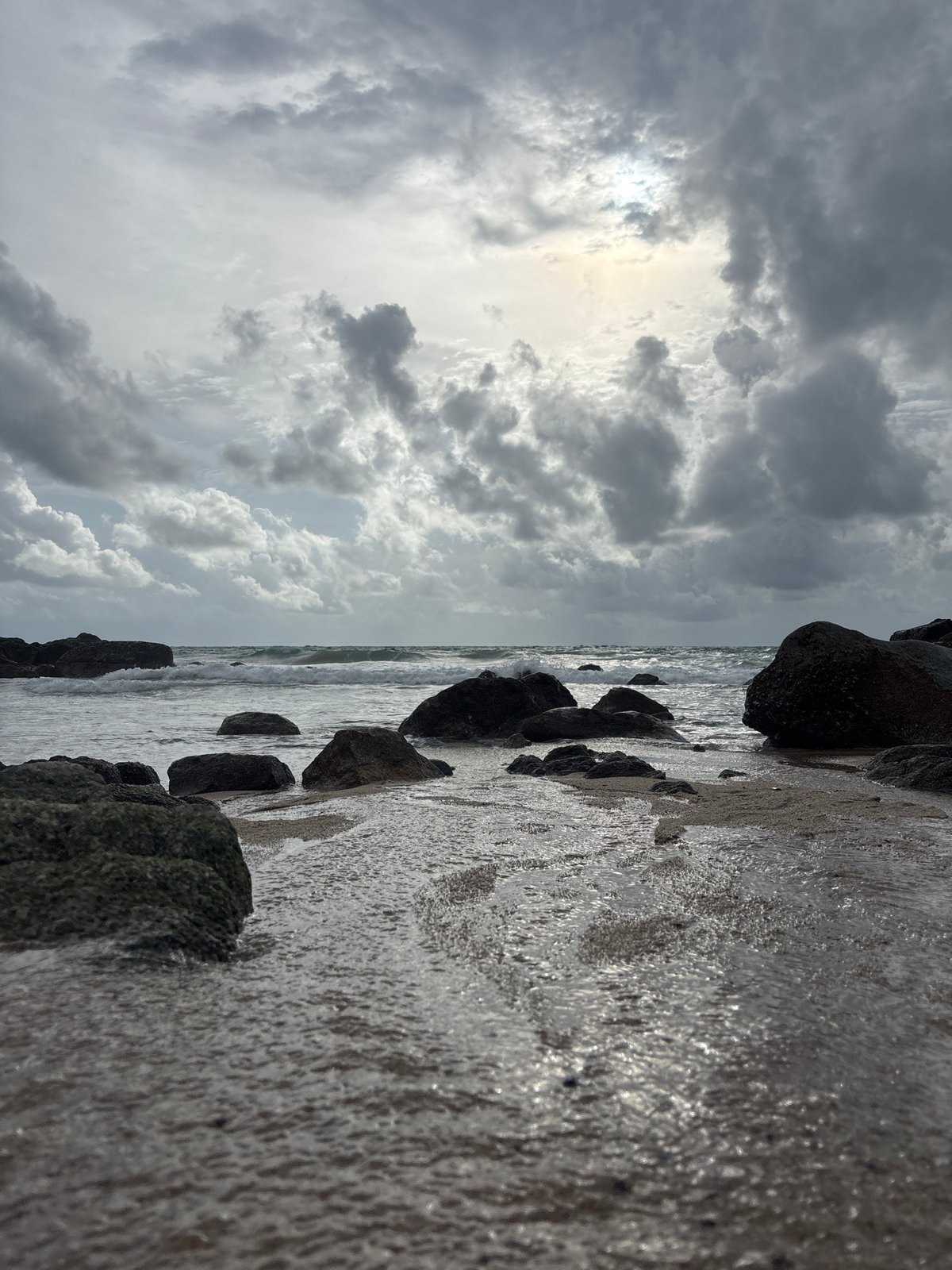 Overcast beach day draws visitors to Choeng Thale, Thailand