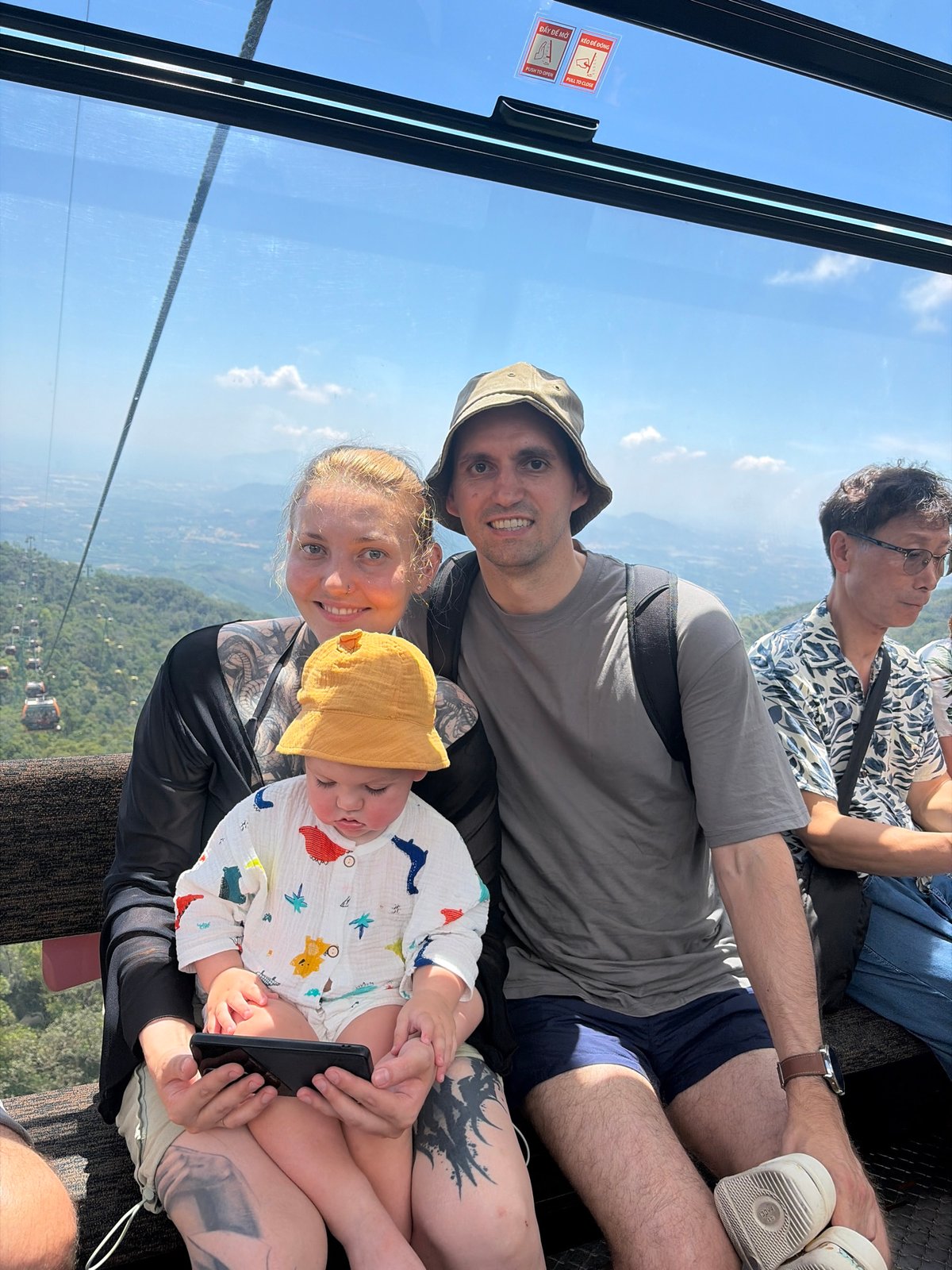 Family and elderly passenger ride cable car in Đà Nẵng
