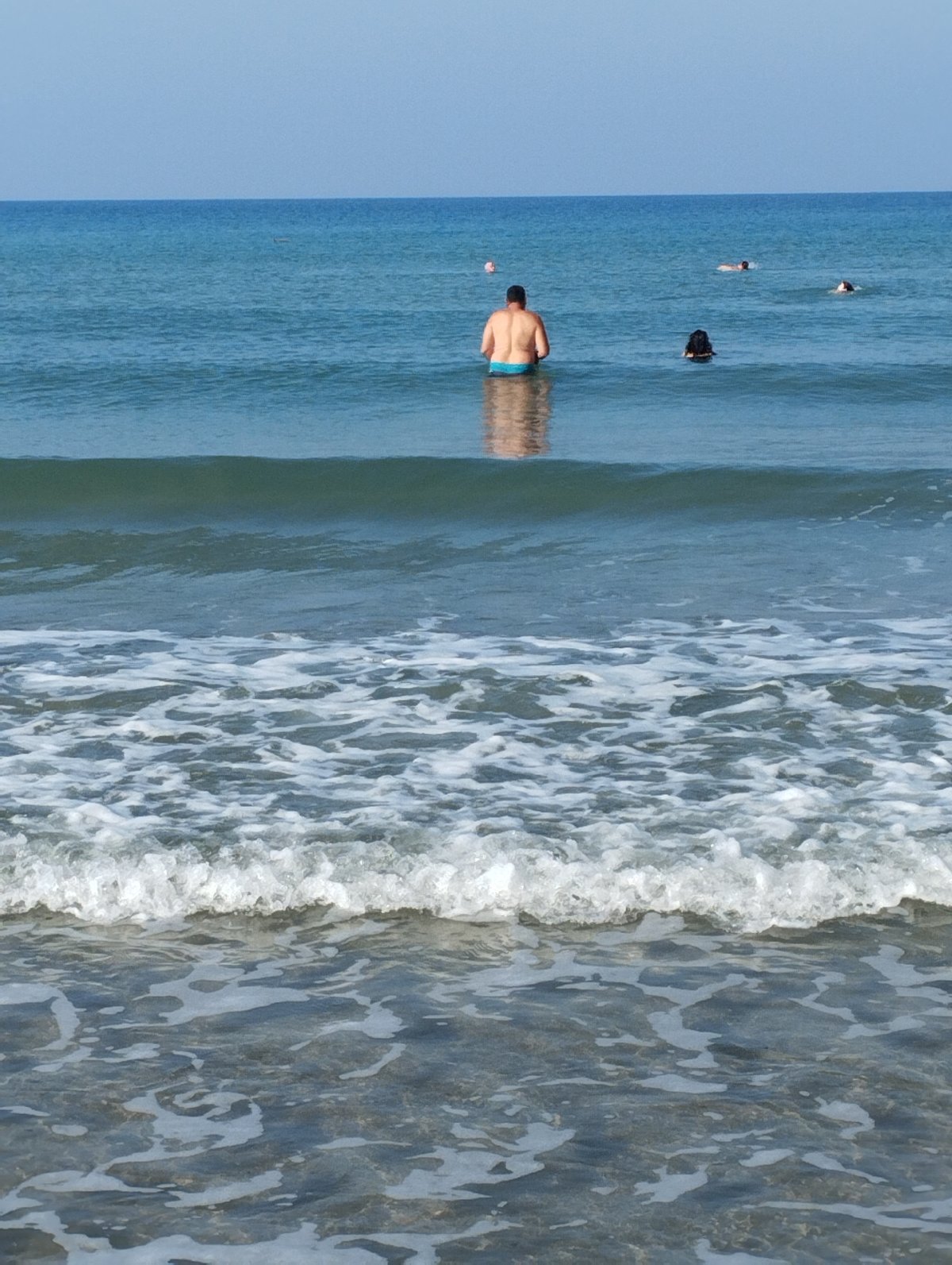 A laid-back beach morning with flowers and shoreline scenes