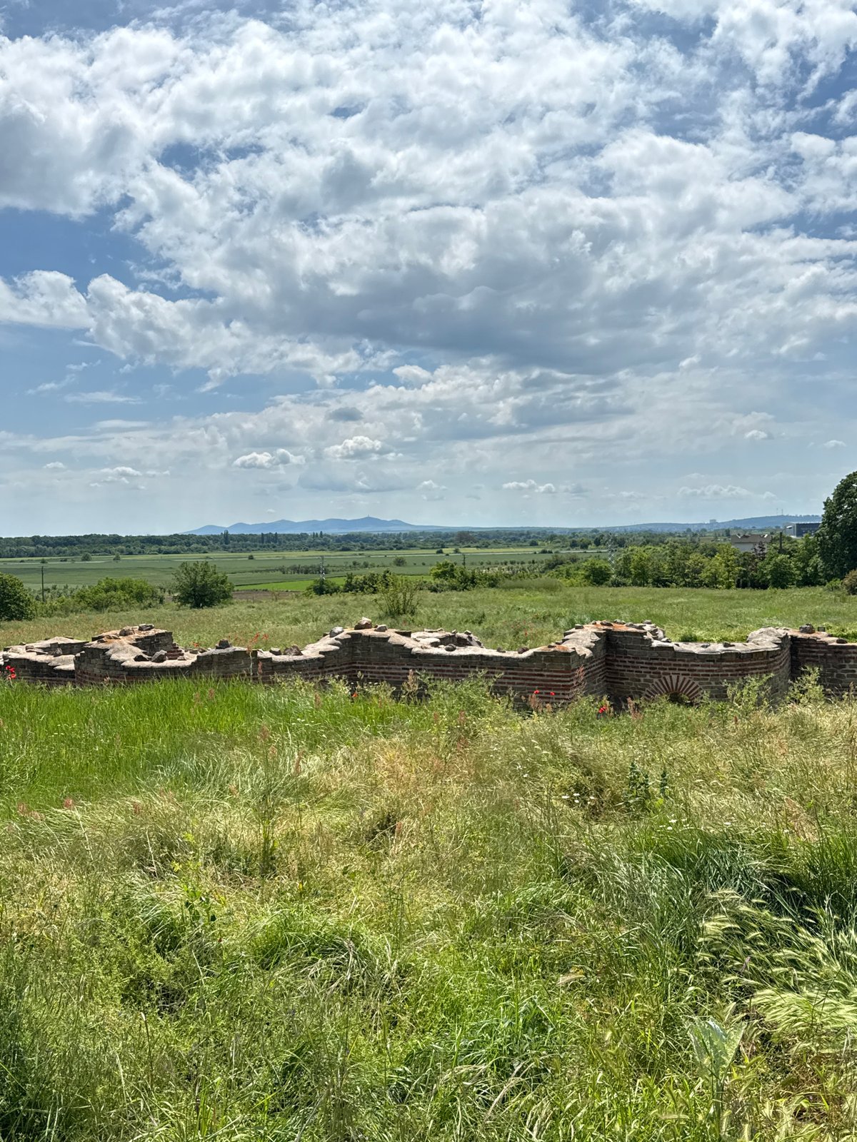 Tourist documents ancient Kabile archaeological site in Bulgaria