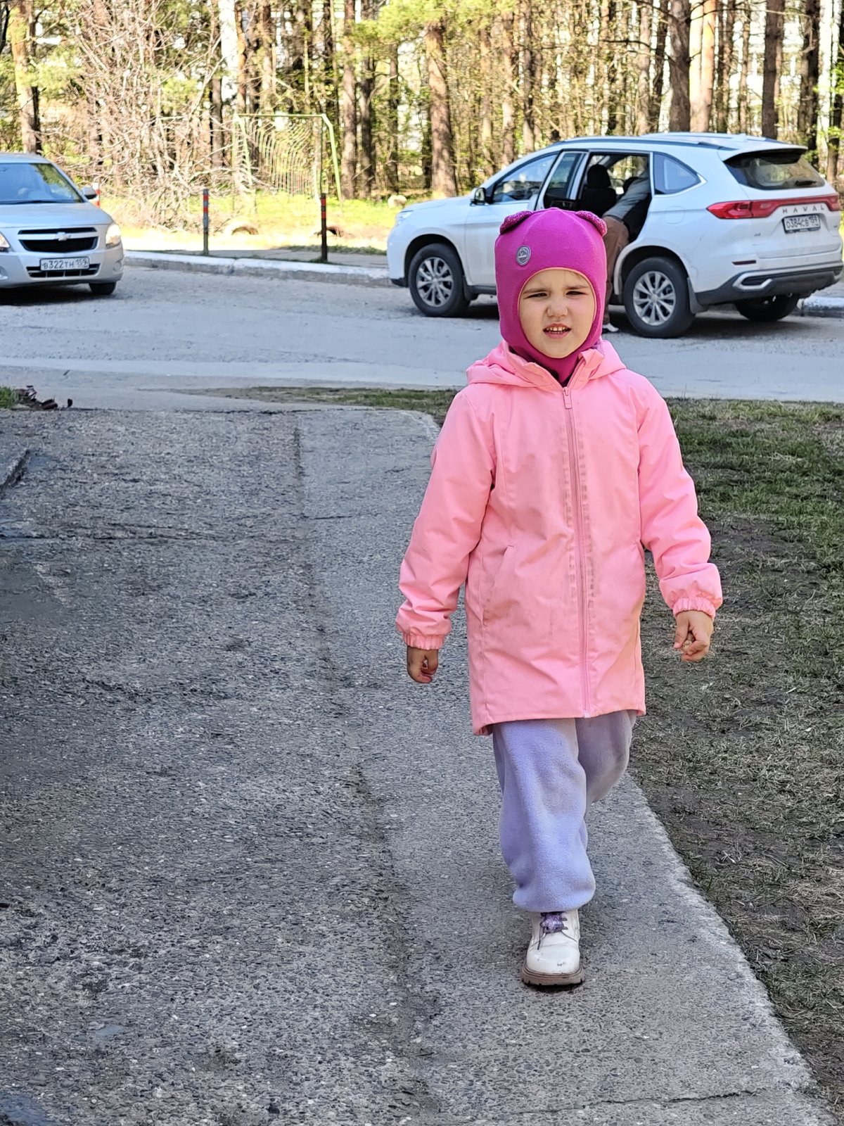 Family playground activities documented across Chaikovsky, Russia morning hours