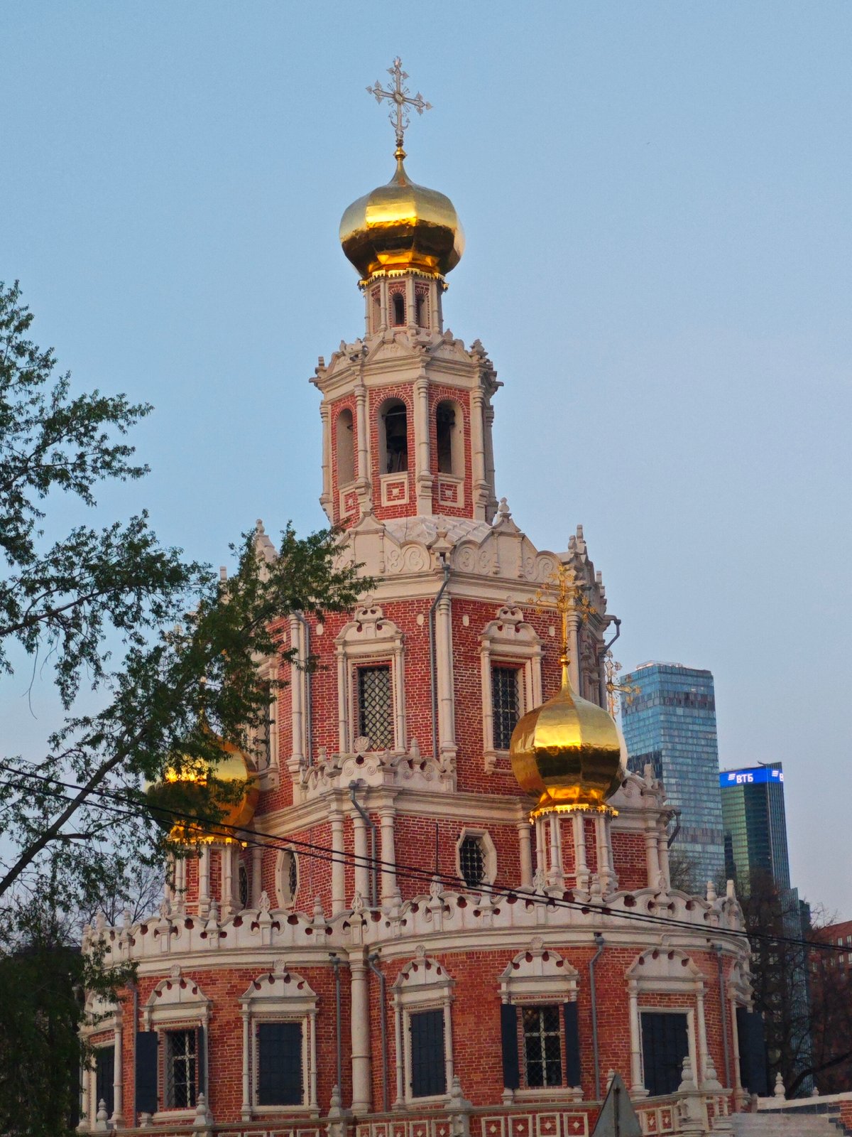 Moscow's historic Orthodox architecture juxtaposed with modern skyline development