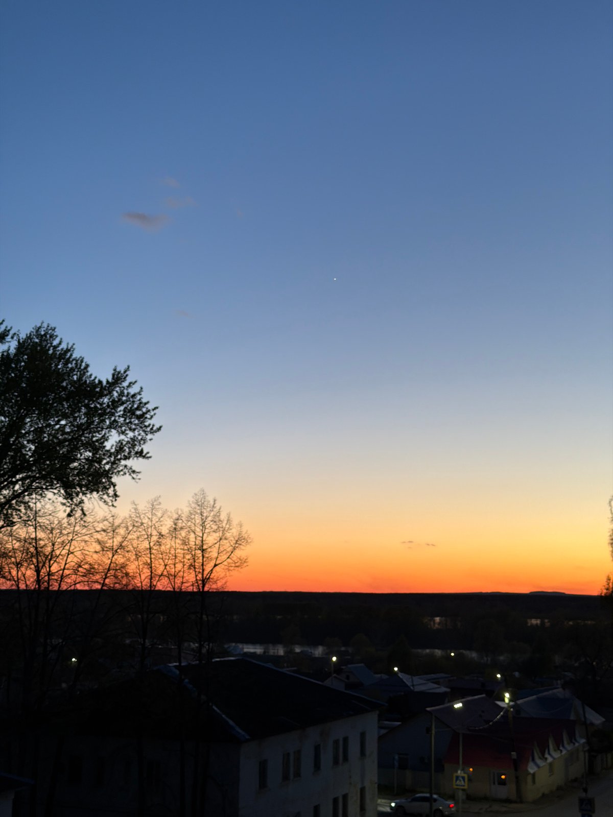 Evening life documented across Chaikovsky, Russia in spring twilight