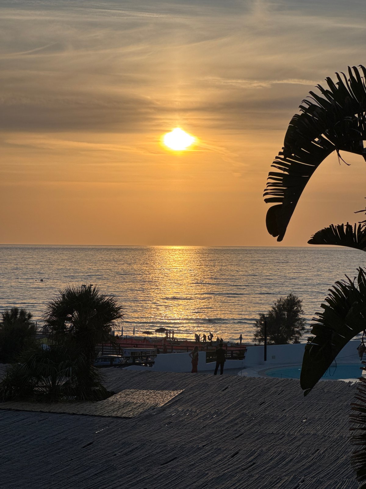 Mediterranean sunset captured across Italian coastal towns during evening