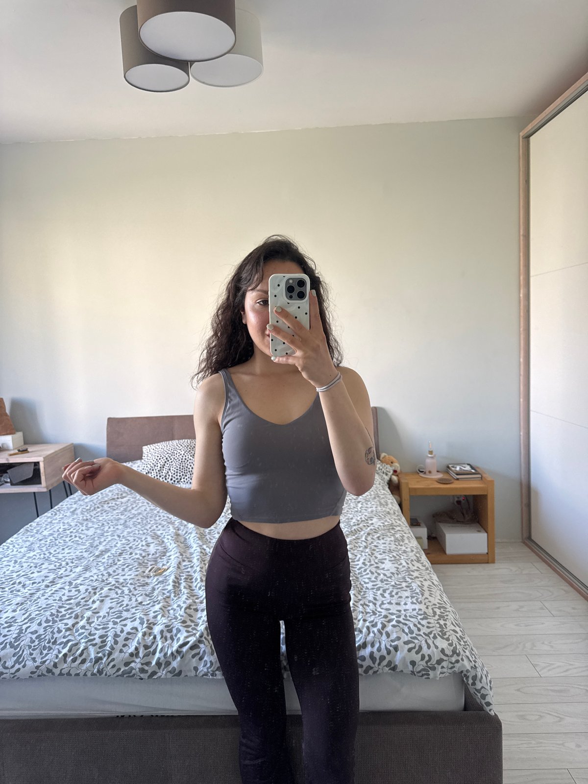 Woman's morning selfie session documented in Burgas bedroom