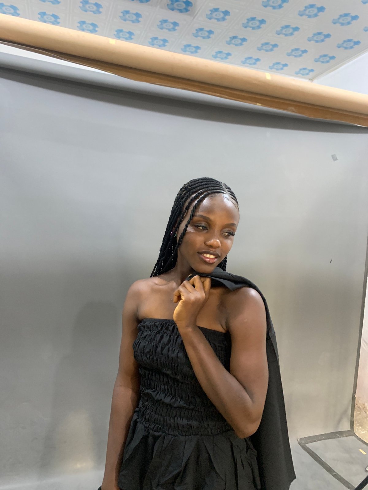 Photo shoot session documented in Gura Top, Nigeria studio