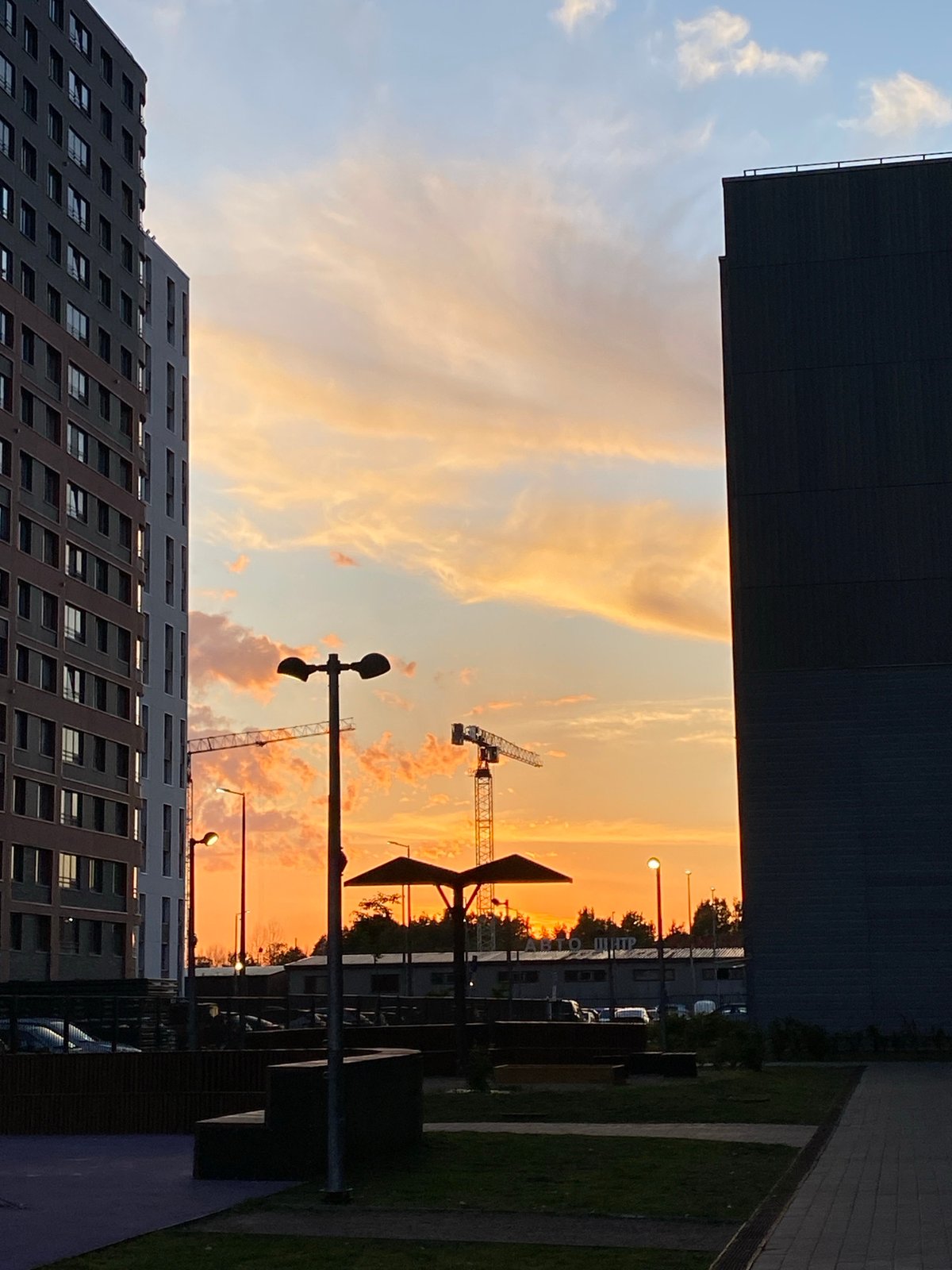 Vibrant sunset illuminates Saint Petersburg's modern skyline