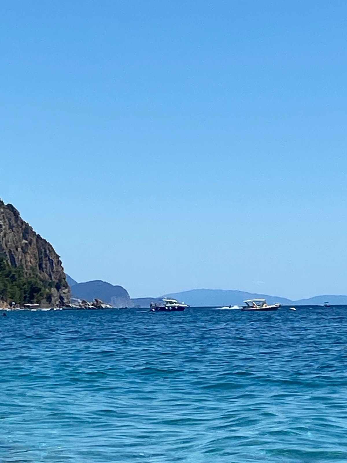 Lazy summer day on a Montenegrin pebble beach
