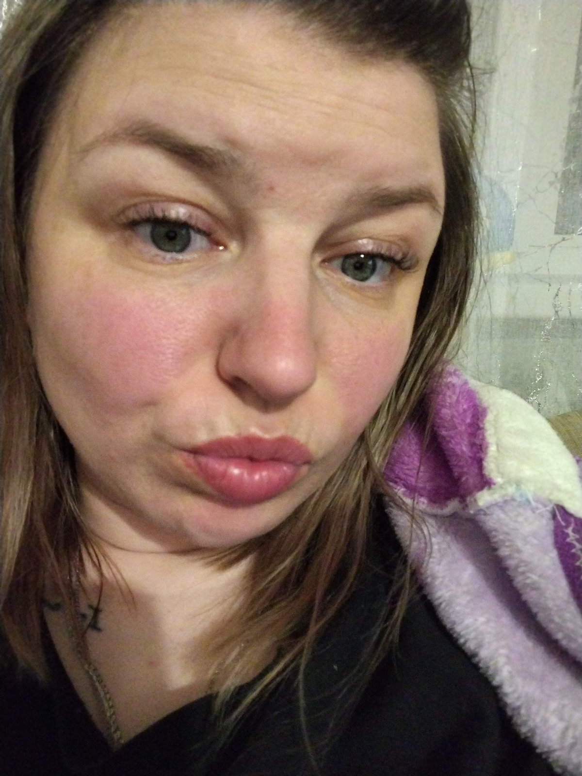 Woman takes selfie with blanket in Yaroslavl