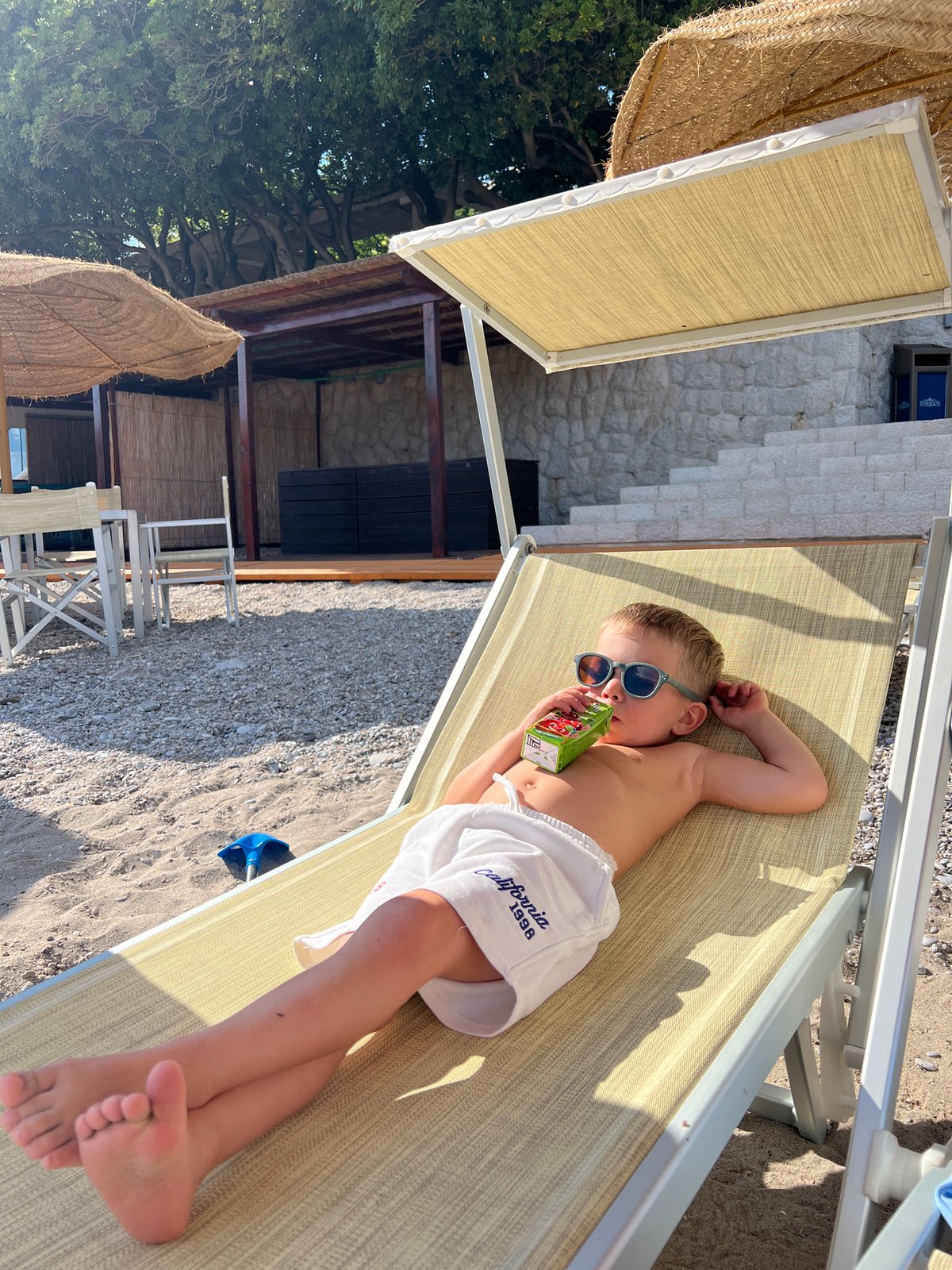 Beachgoers document leisurely afternoon moments at Prijevor, Montenegro resort