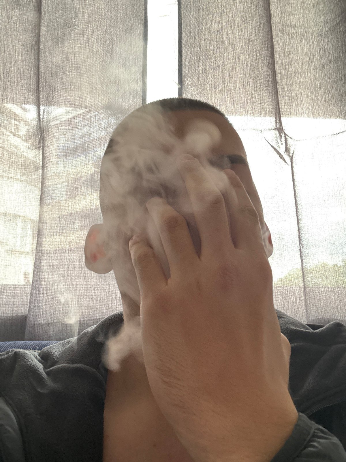 Person vaping indoors captured in Plovdiv, Bulgaria