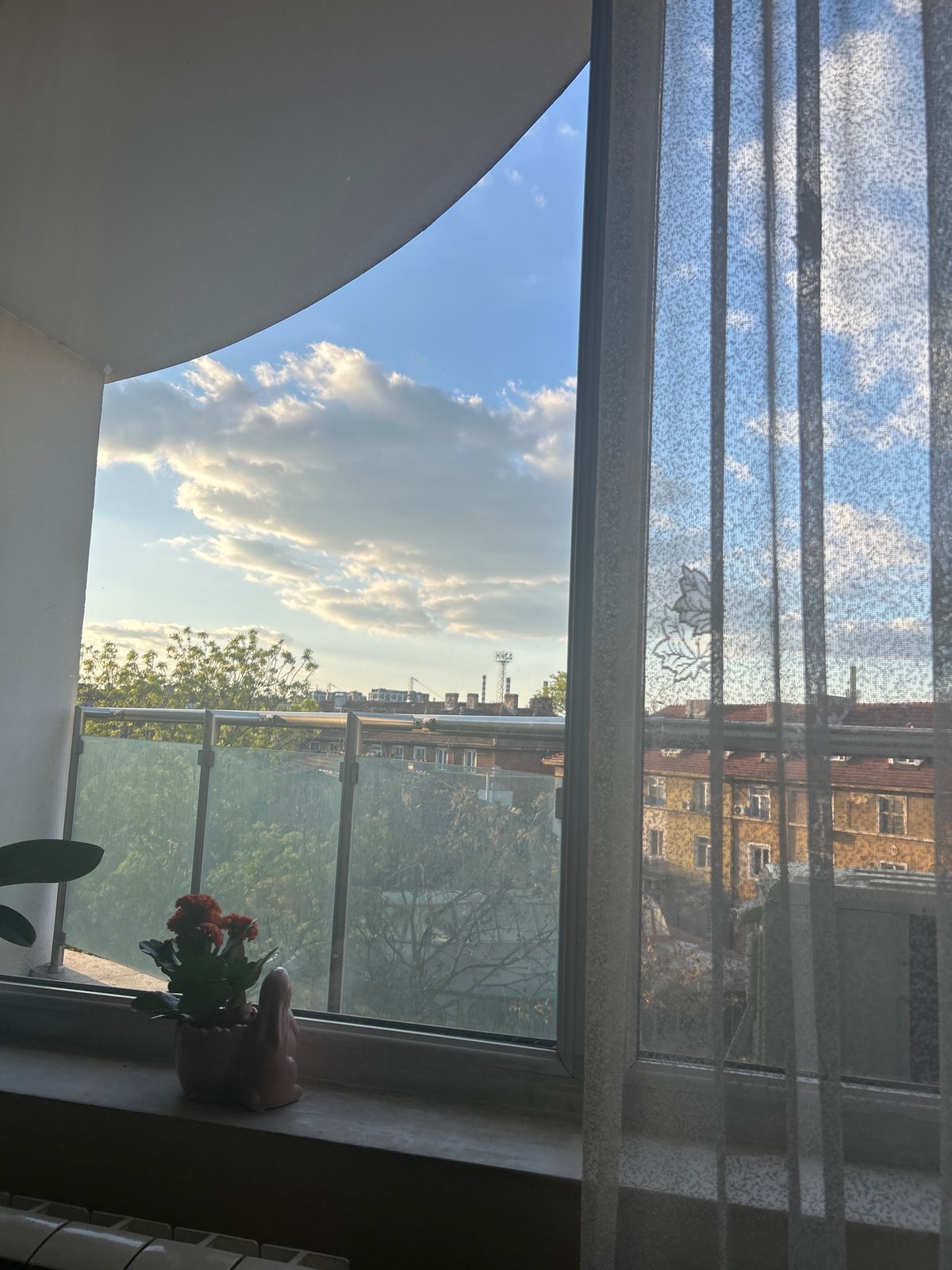 Window view captured showing building across street in Sofia