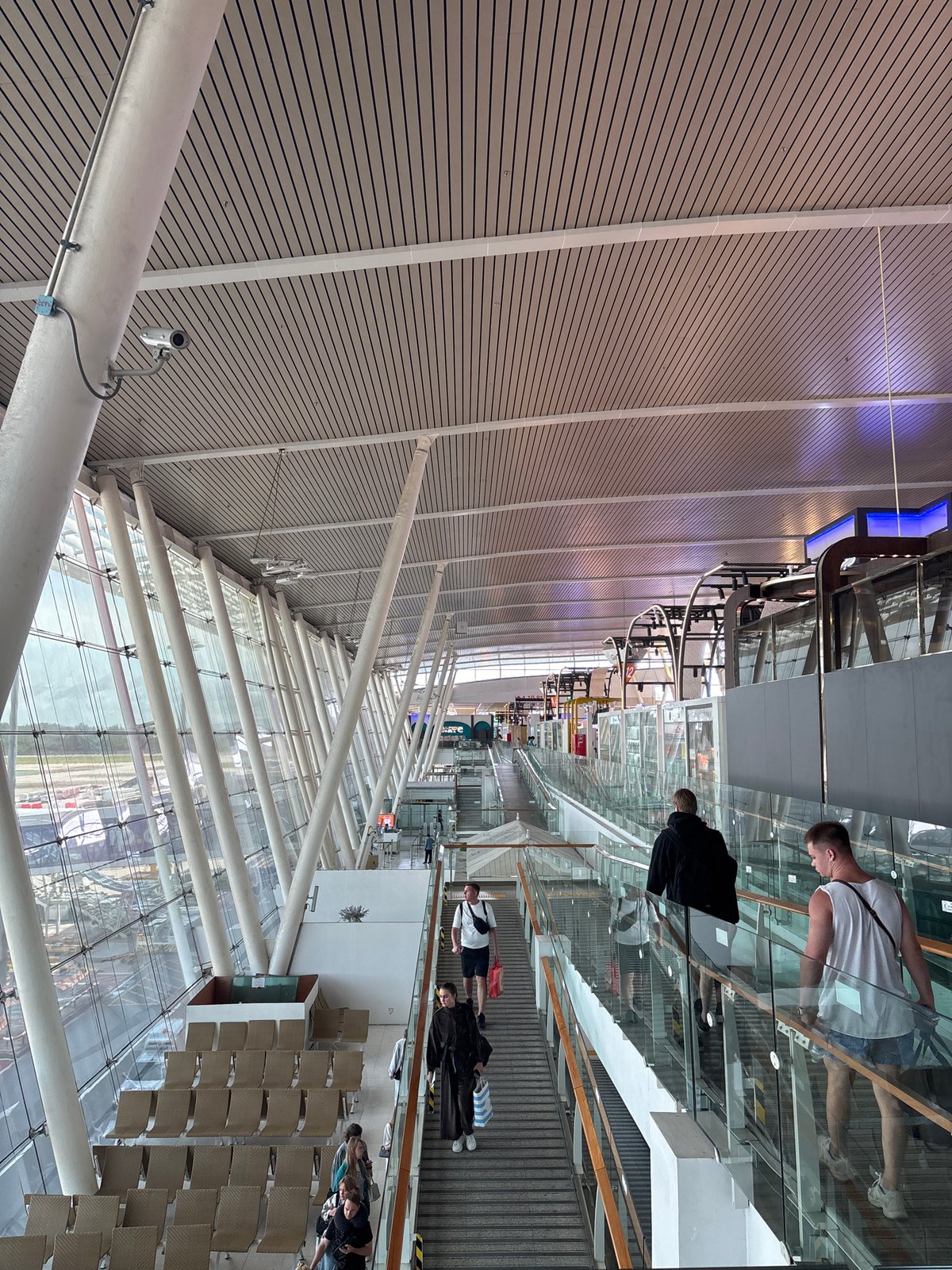 Traveler documents journey through Phuket International Airport terminal and flight