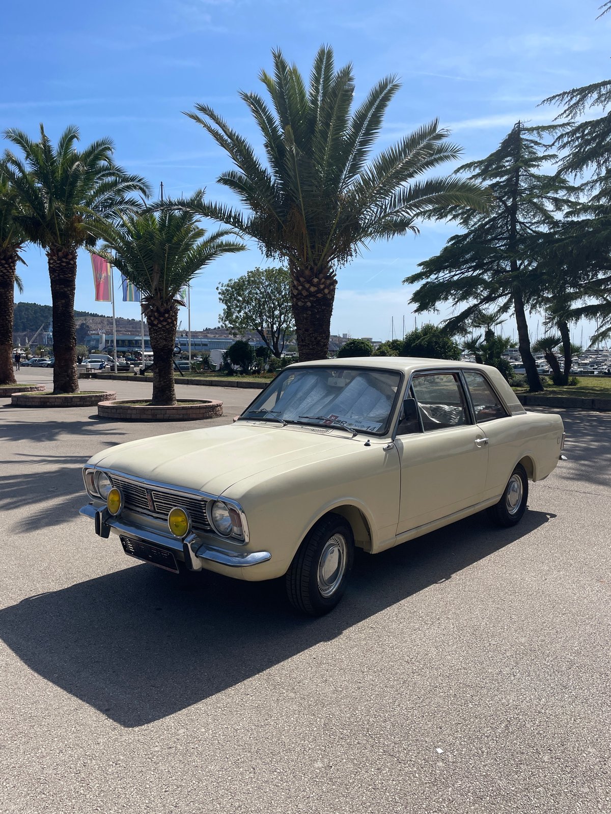 Vintage car and coastal promenade documented in Bar, Montenegro