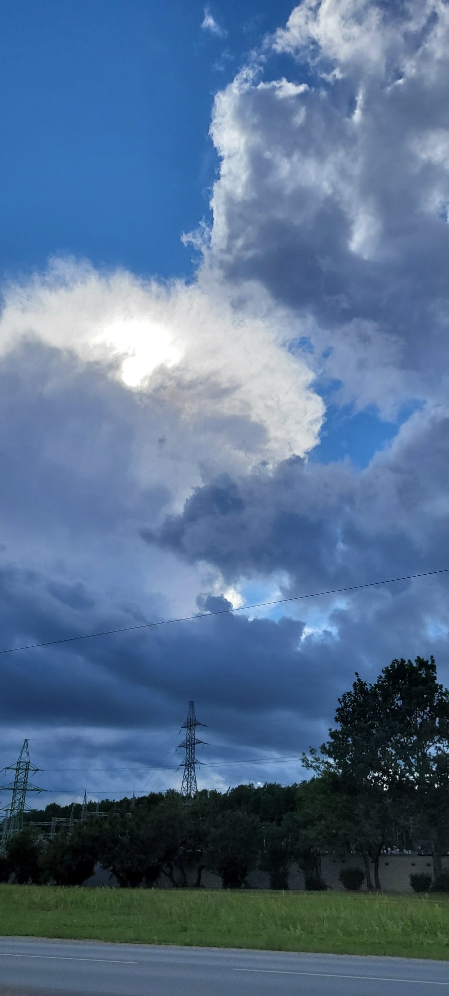 Riga infrastructure and street scenes under a dramatic July sky