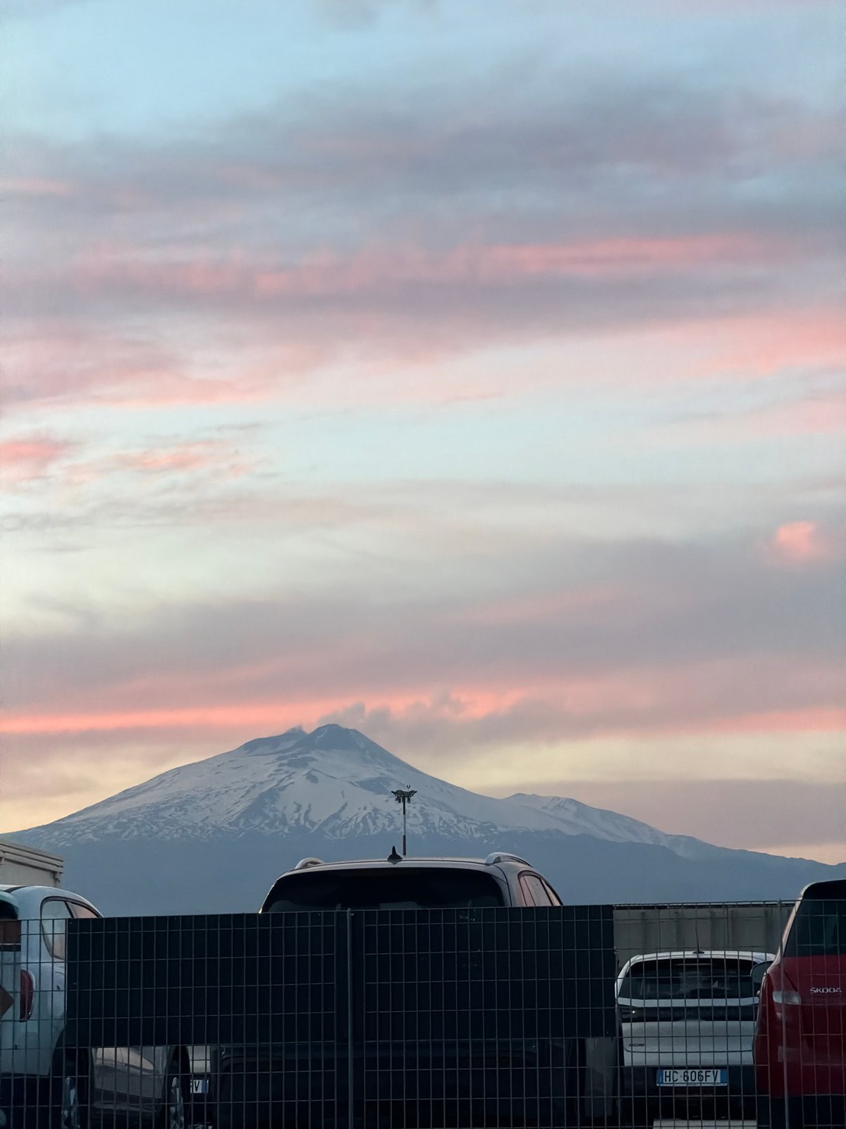 Mount Etna viewed at sunset from Catania parking area