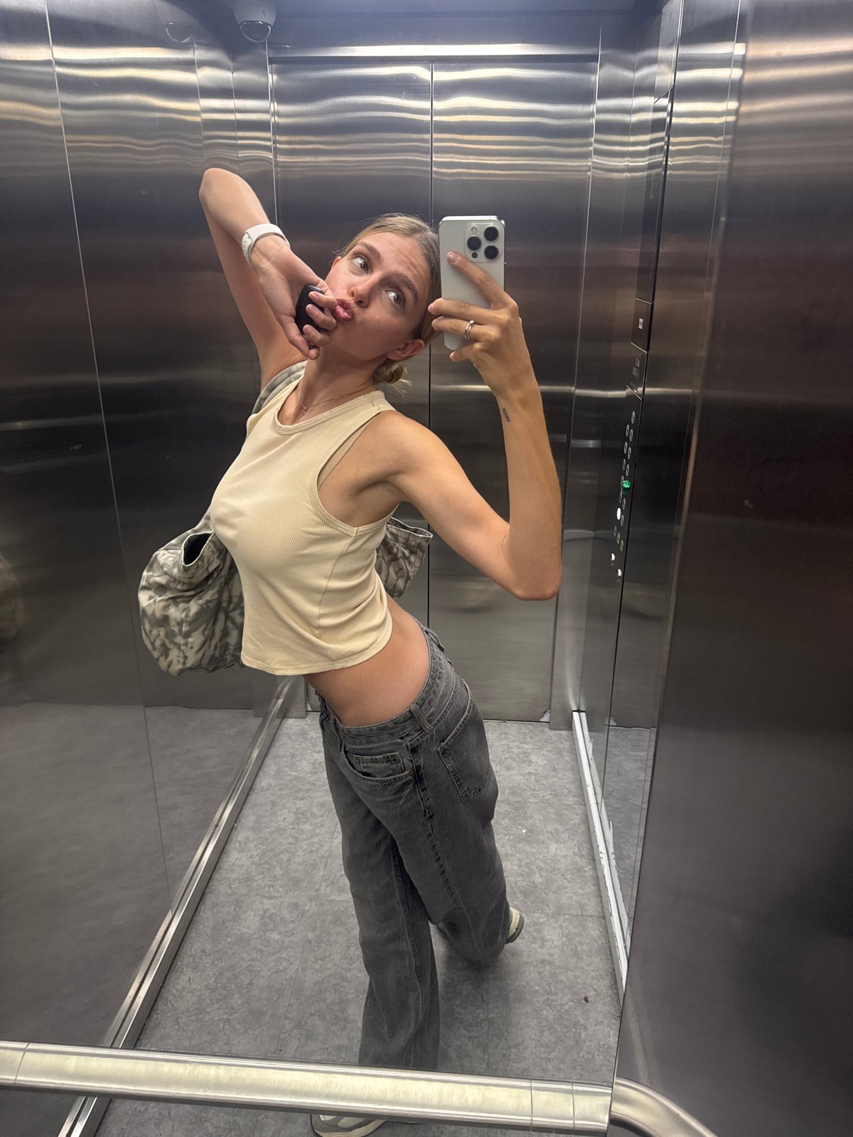 Woman takes elevator selfies, pasta dish photographed