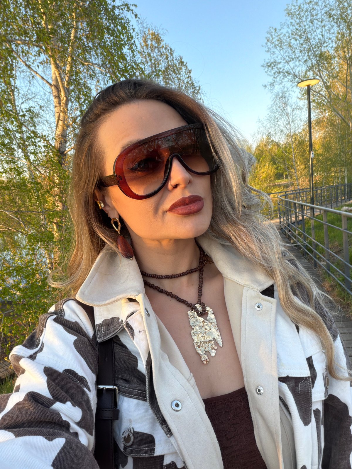 Woman photographed, motorboat spotted in Krasnoyarsk waterfront area