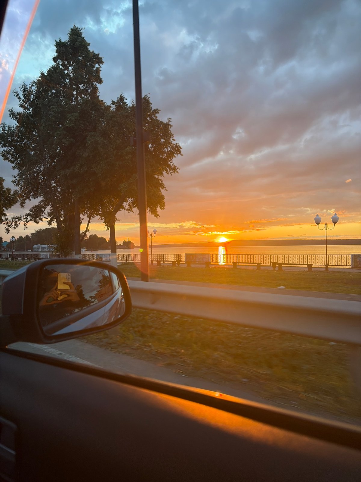 Sunset documented across Votkinsk, Russia from multiple vehicle perspectives