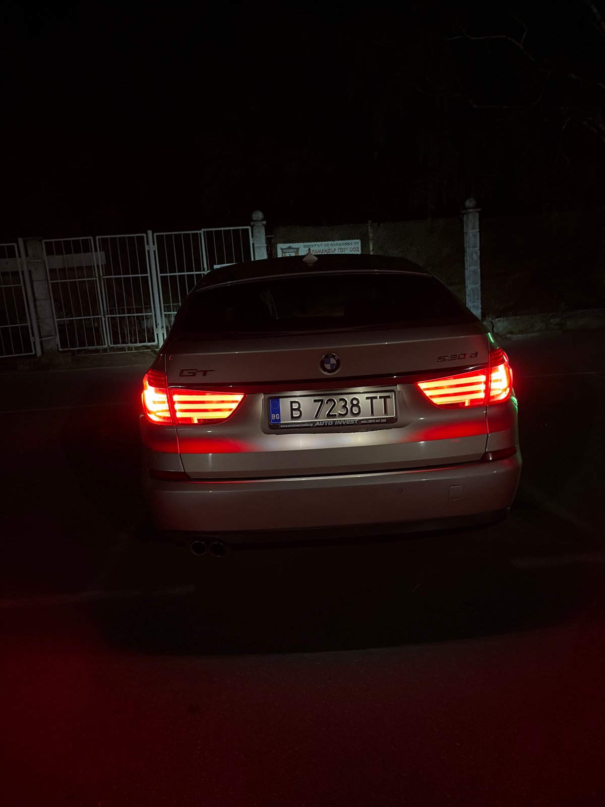 Nighttime drive documented through Kazanlak, Bulgaria in BMW sedan