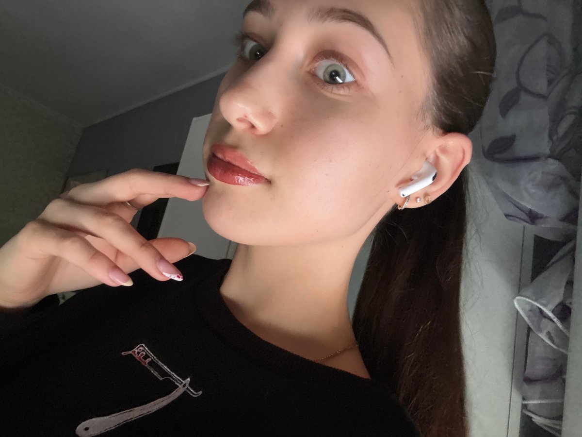 Woman takes selfies in Sofia apartment Friday afternoon