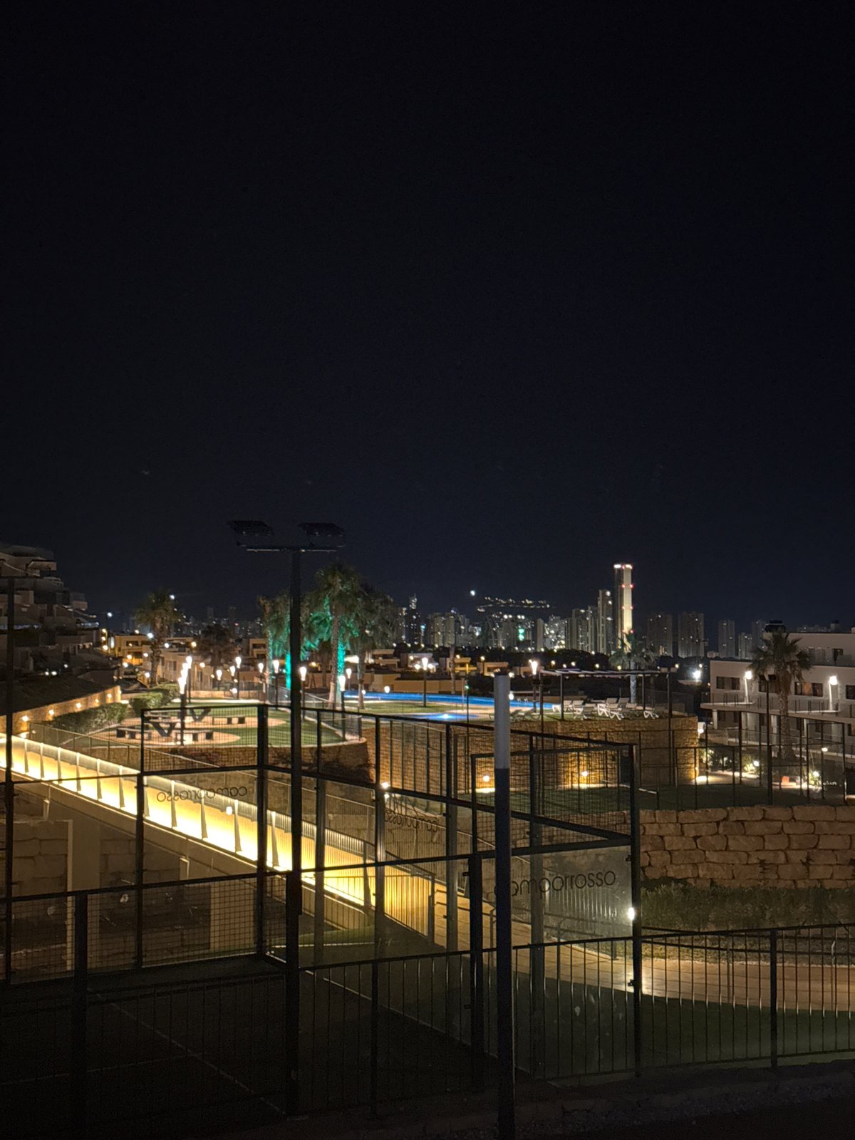 Night stroll through a resort complex in Finestrat, Spain