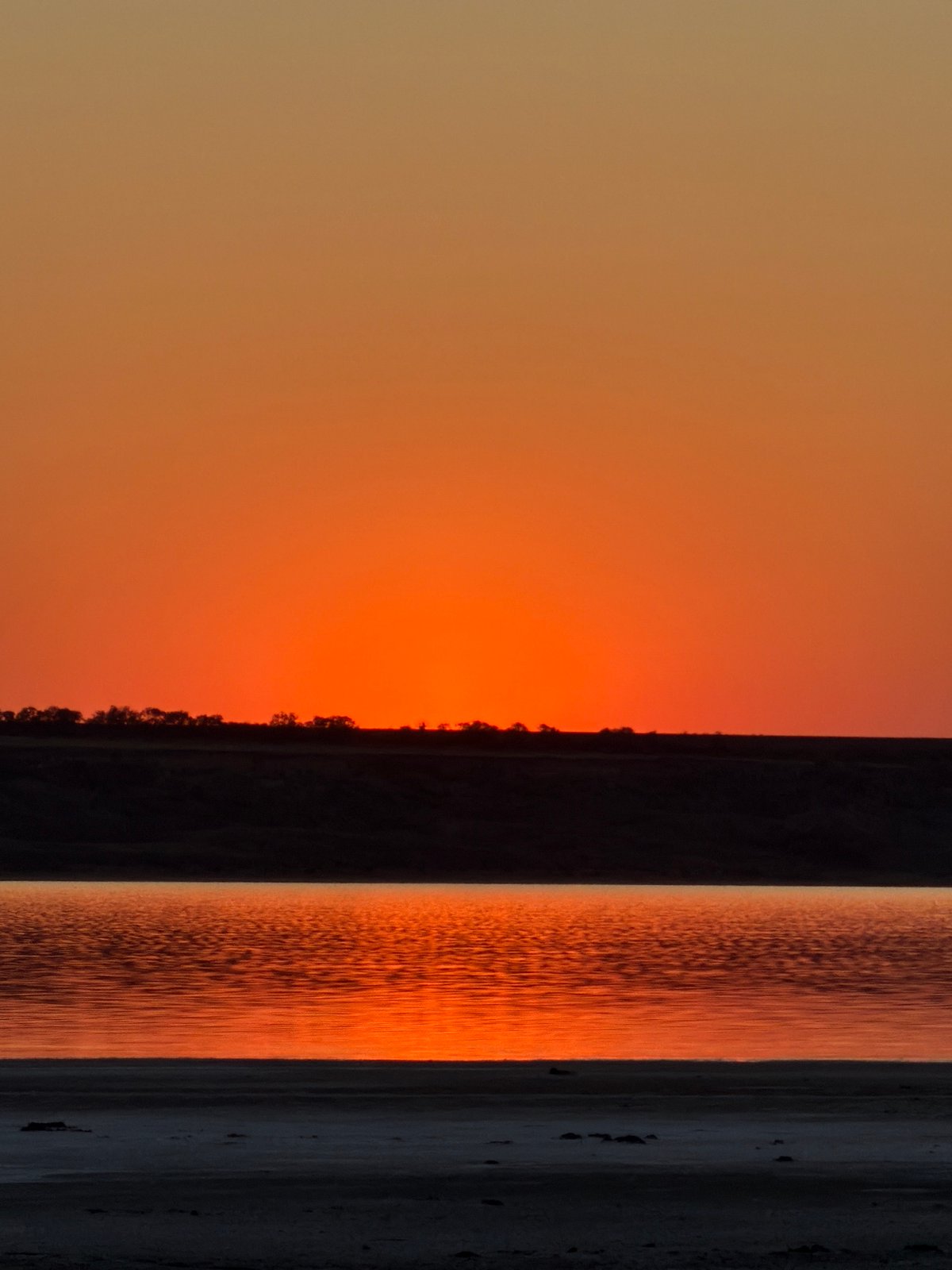 Sunset over calm water near Odesa, Ukraine