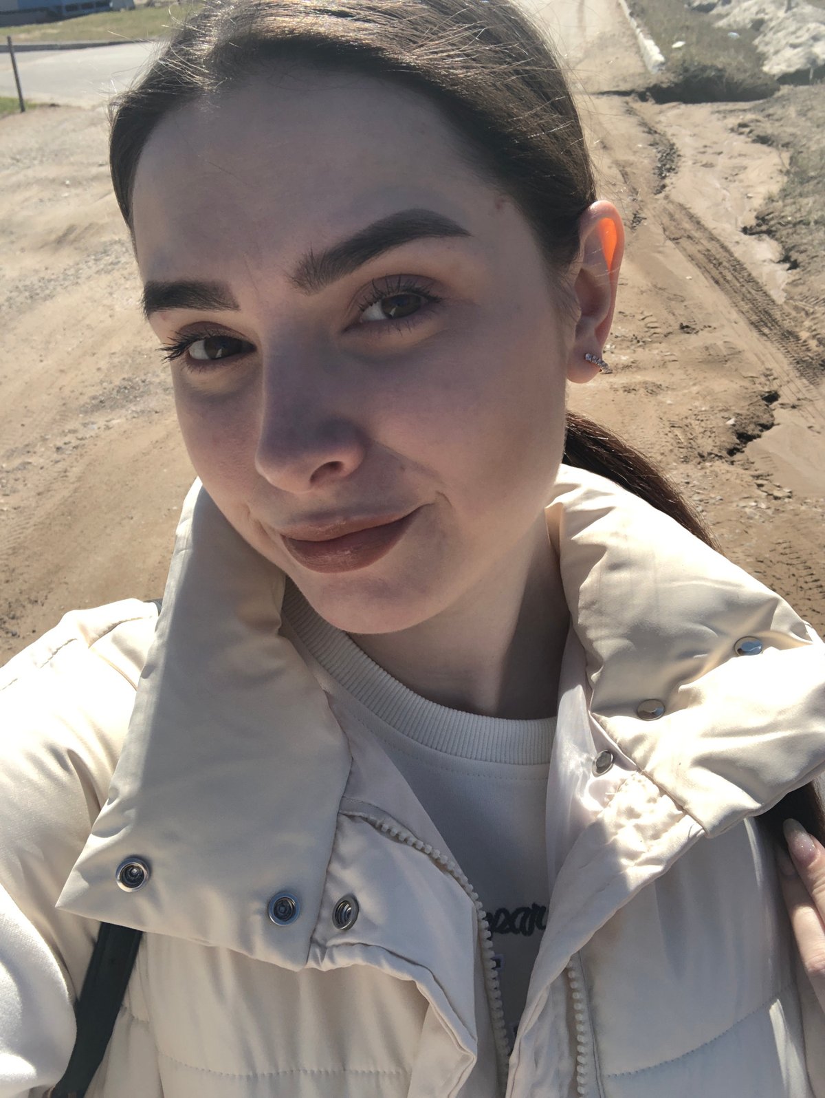 Young woman photographed in casual portraits in Noviy, Russia