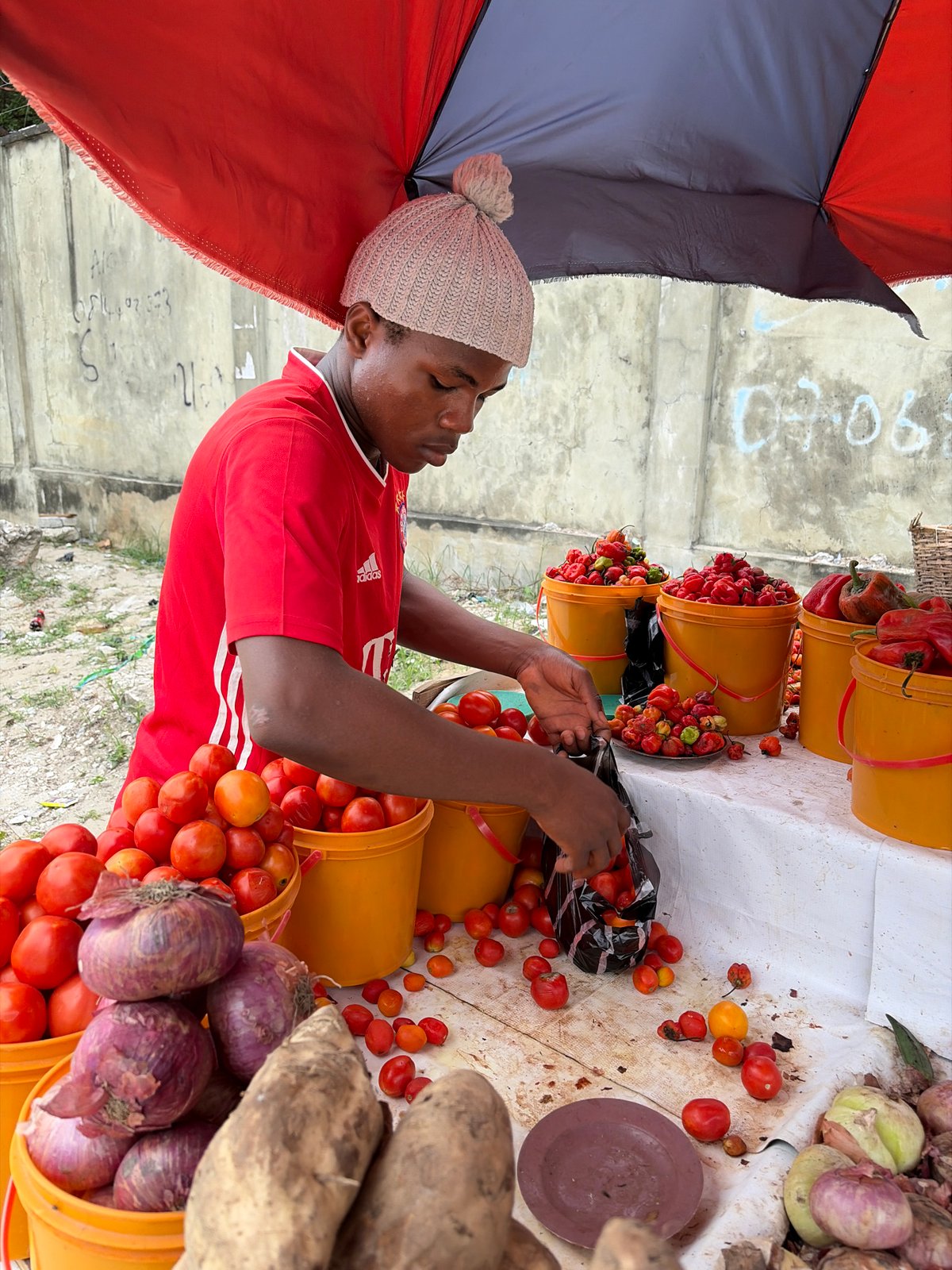 Daily market and repair shop activity in Igboefon, Nigeria
