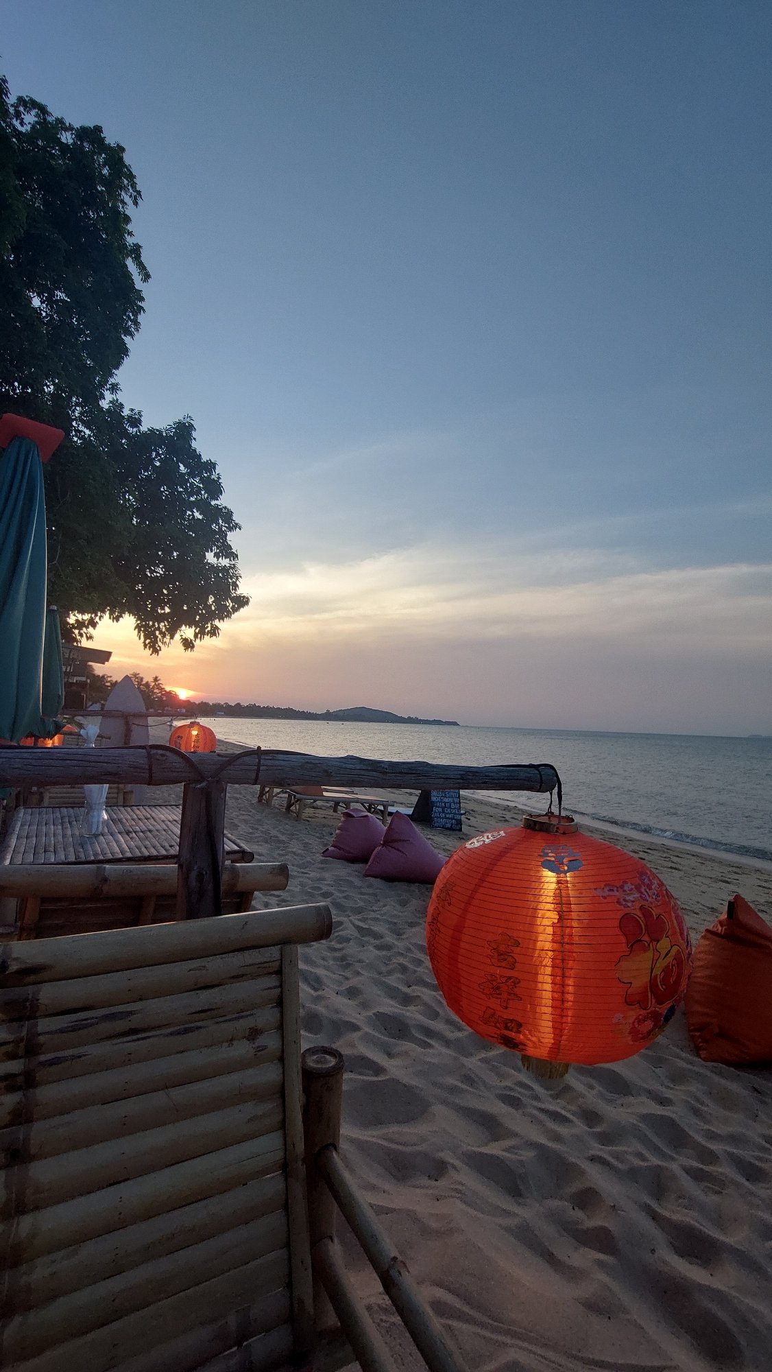 Orange Chinese lantern displayed at Thailand beach sunset