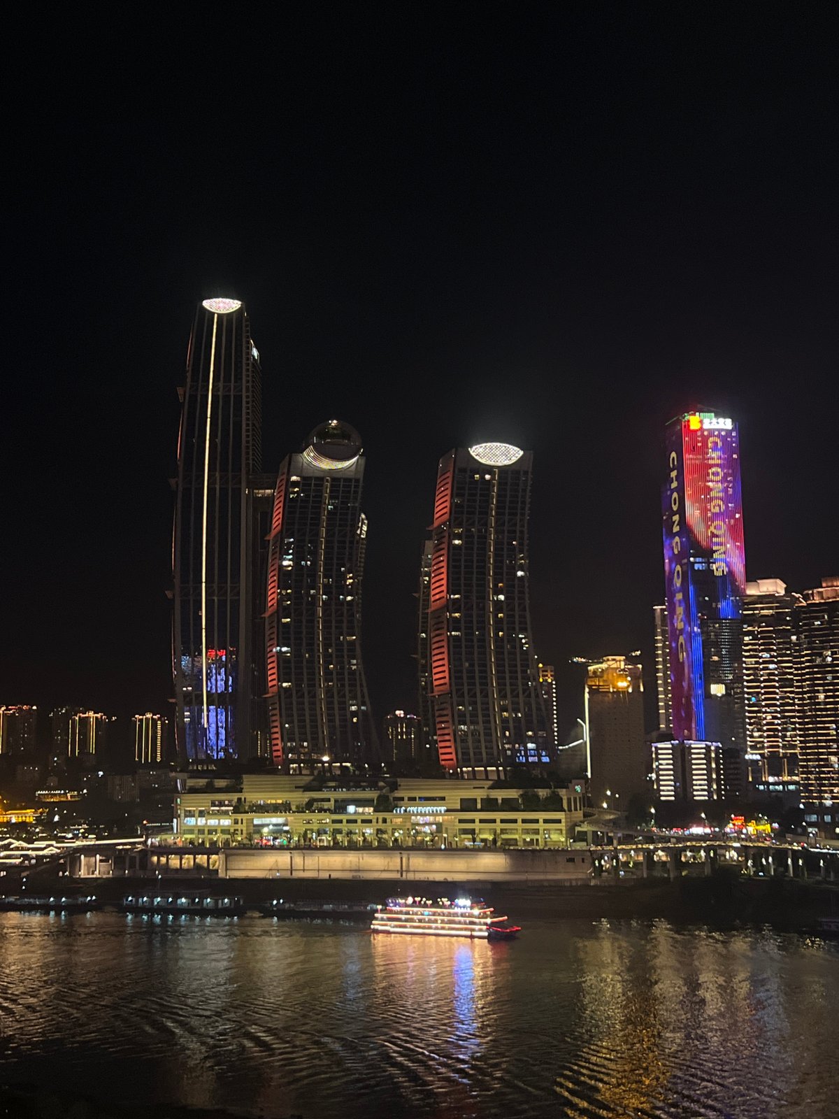 Chongqing's lit-up riverfront skyline at night