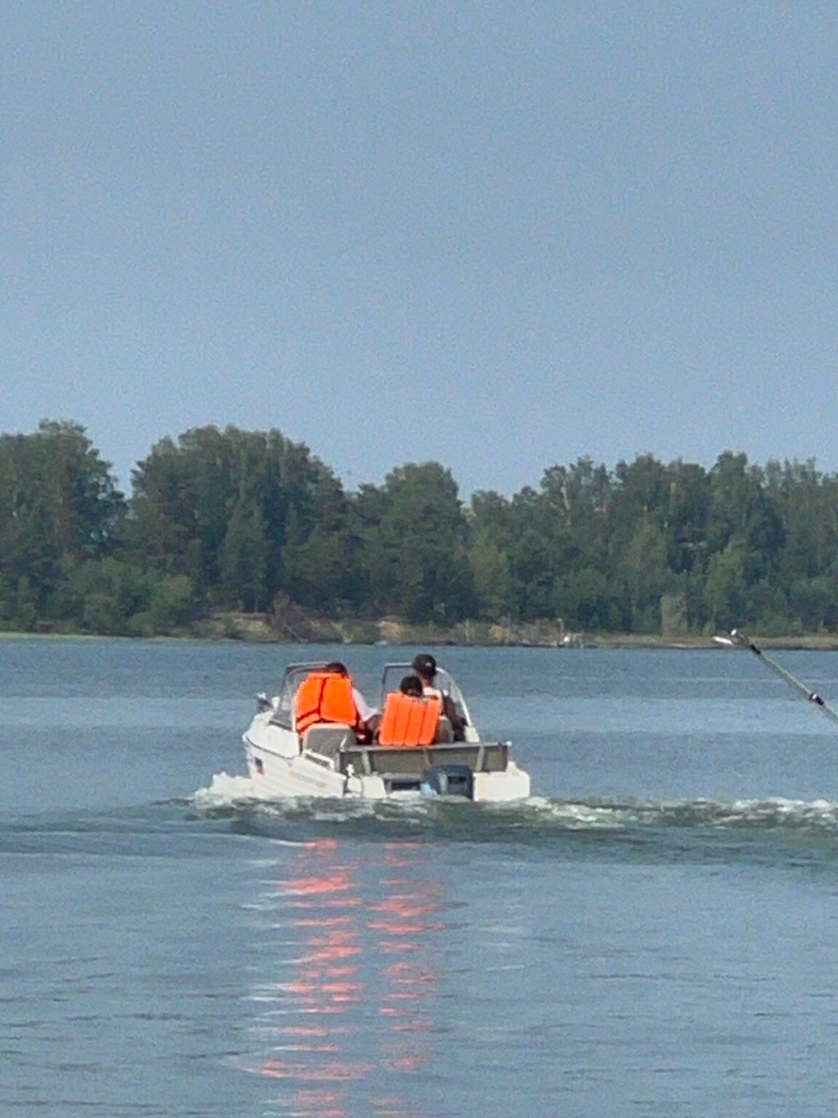 Boating and grilled fish on a summer day at Lake Borovoe