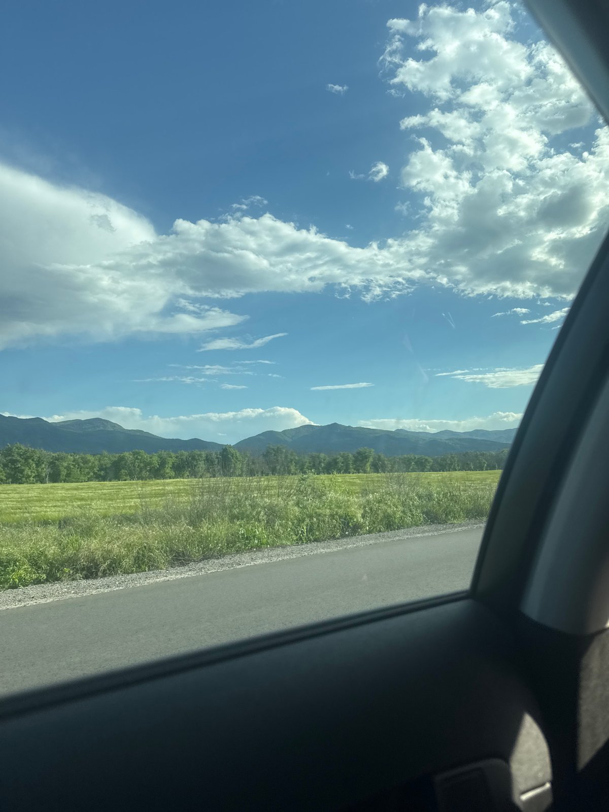 Car passenger captures cloudy sky view in Bulgaria