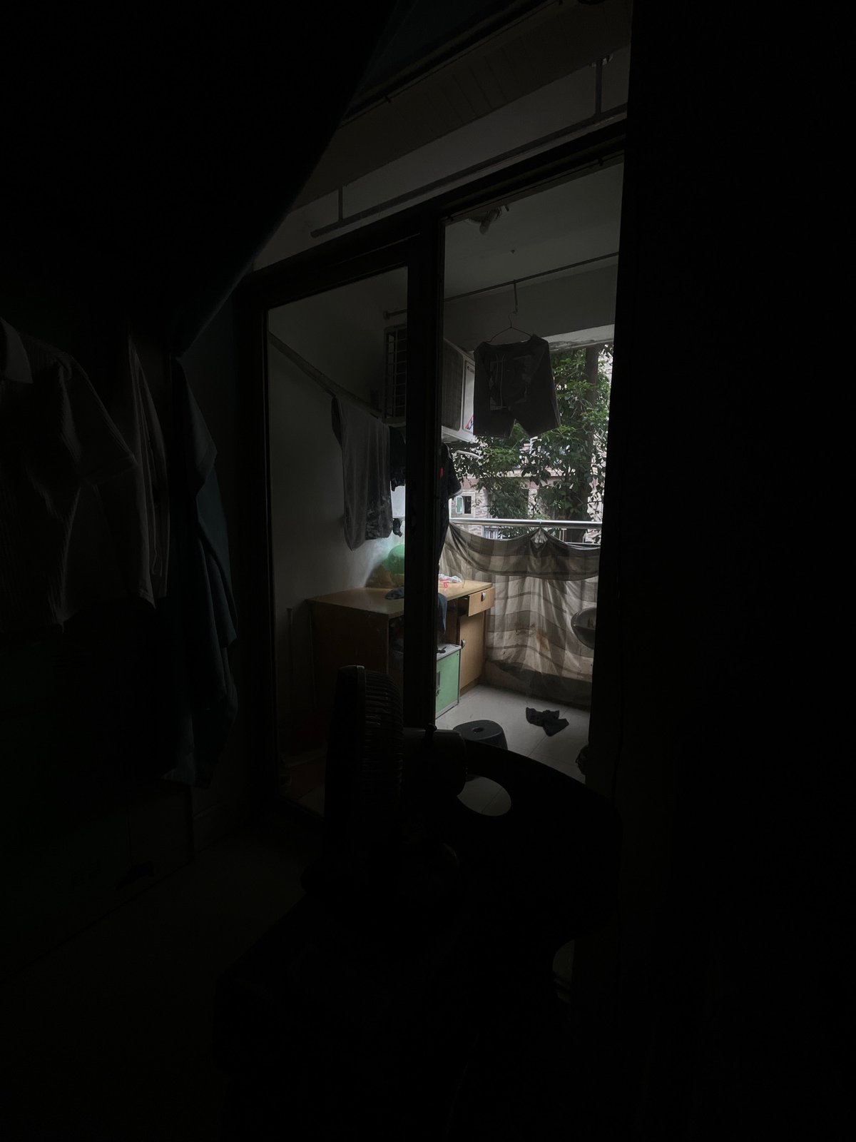 Dimly lit room interior captured in Yuzhong District