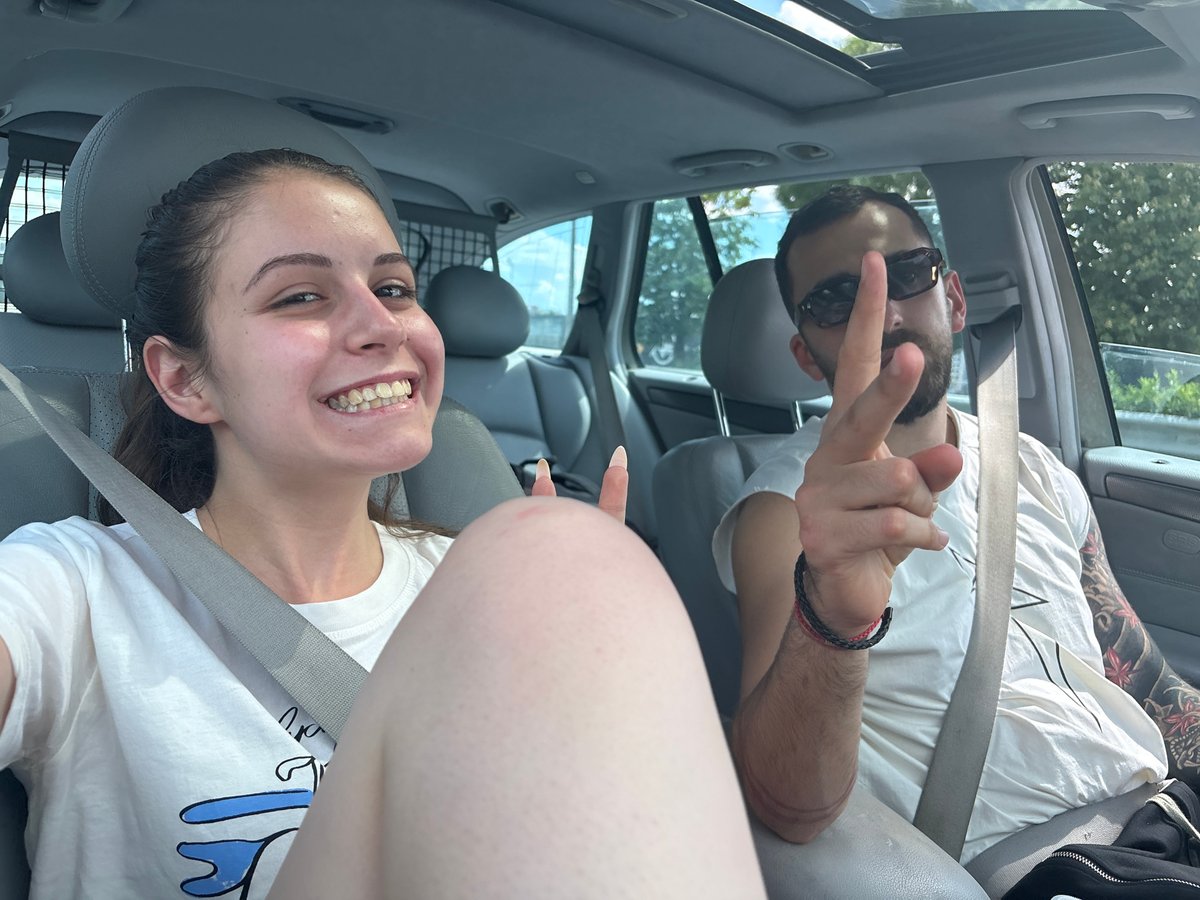 Couple travels through Burgas on sunny afternoon