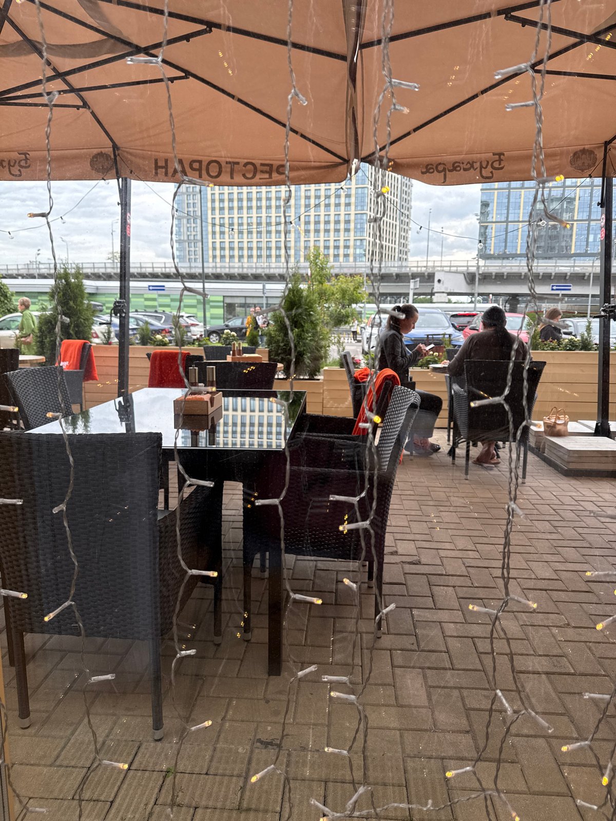 Woman enjoys afternoon cafe visit in Moscow