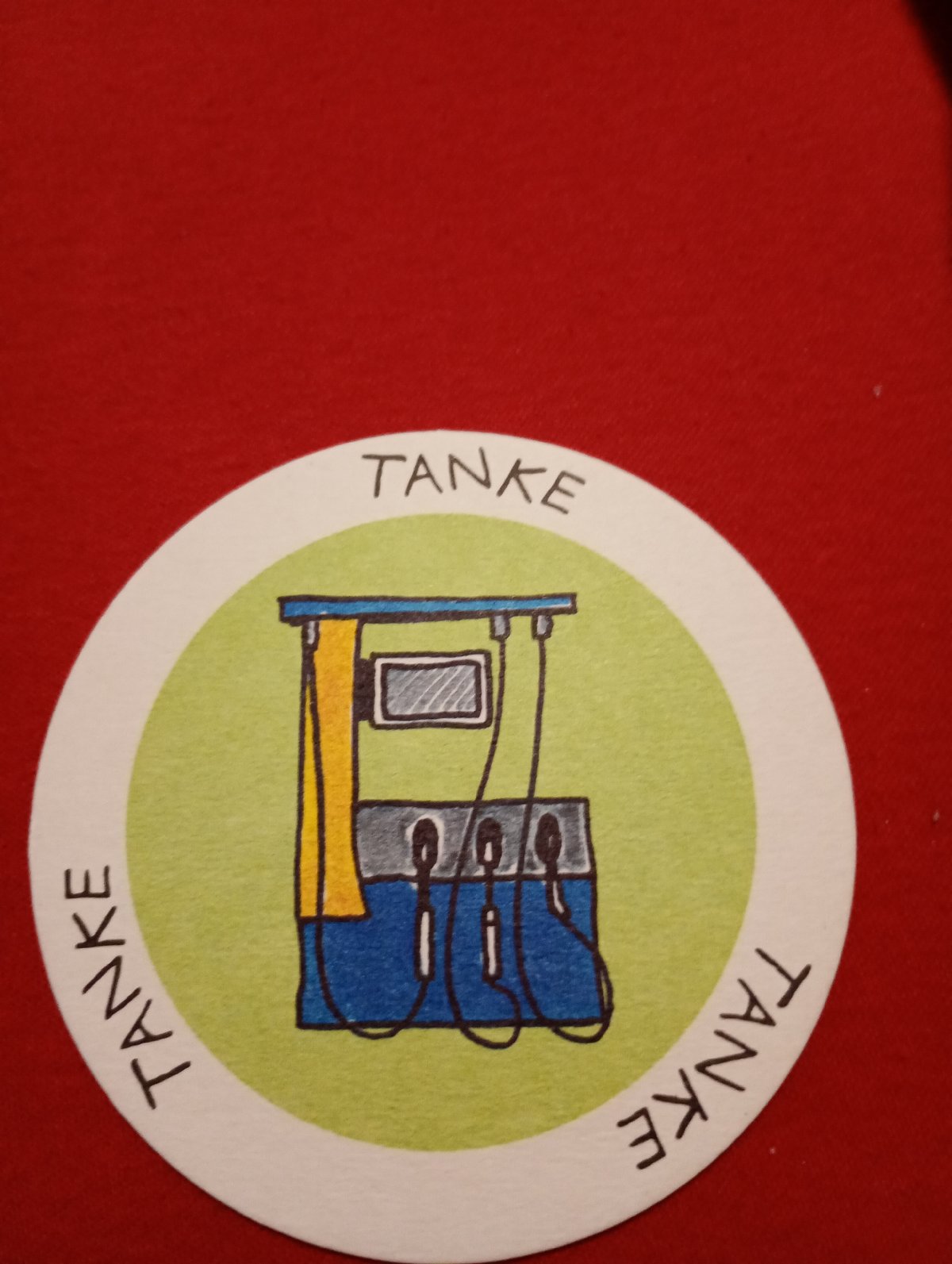 Educational game tokens with German illustrations documented in Rosenheim