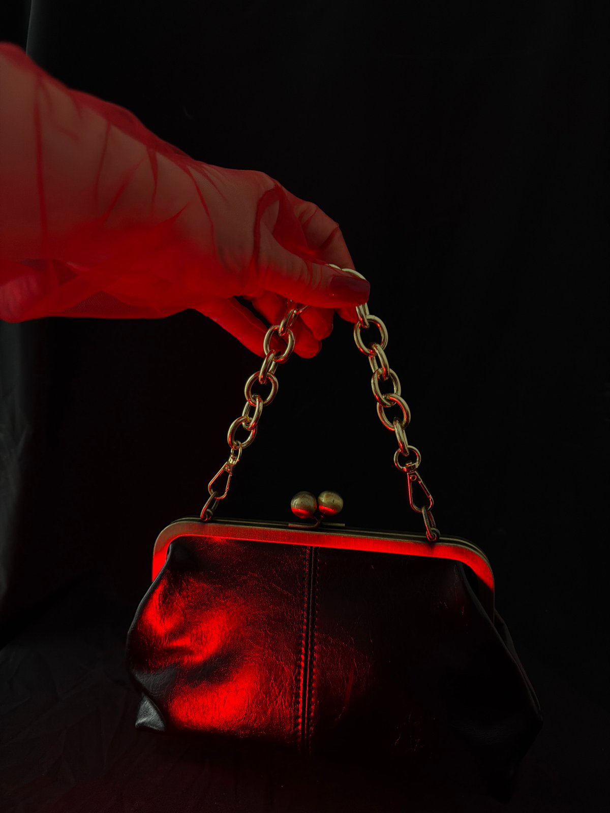 Mystical vintage accessories photographed with dramatic red lighting