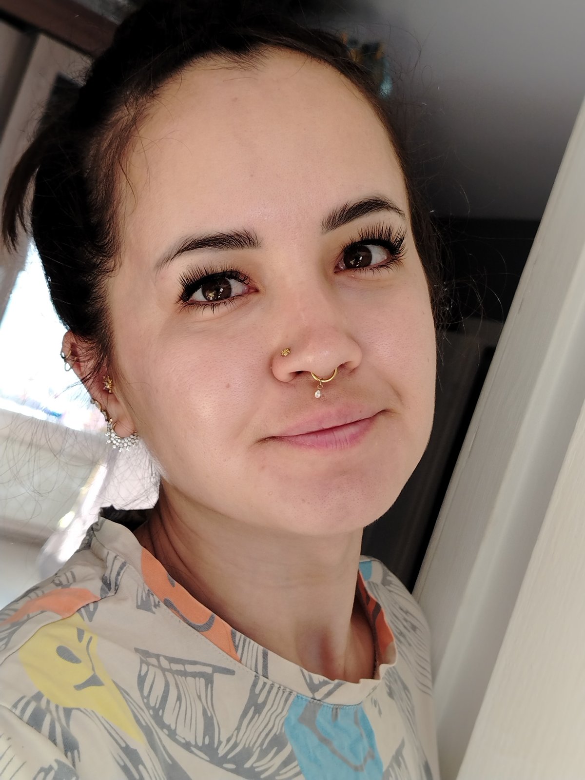 Late-night selfie session captured in Noviy kitchen