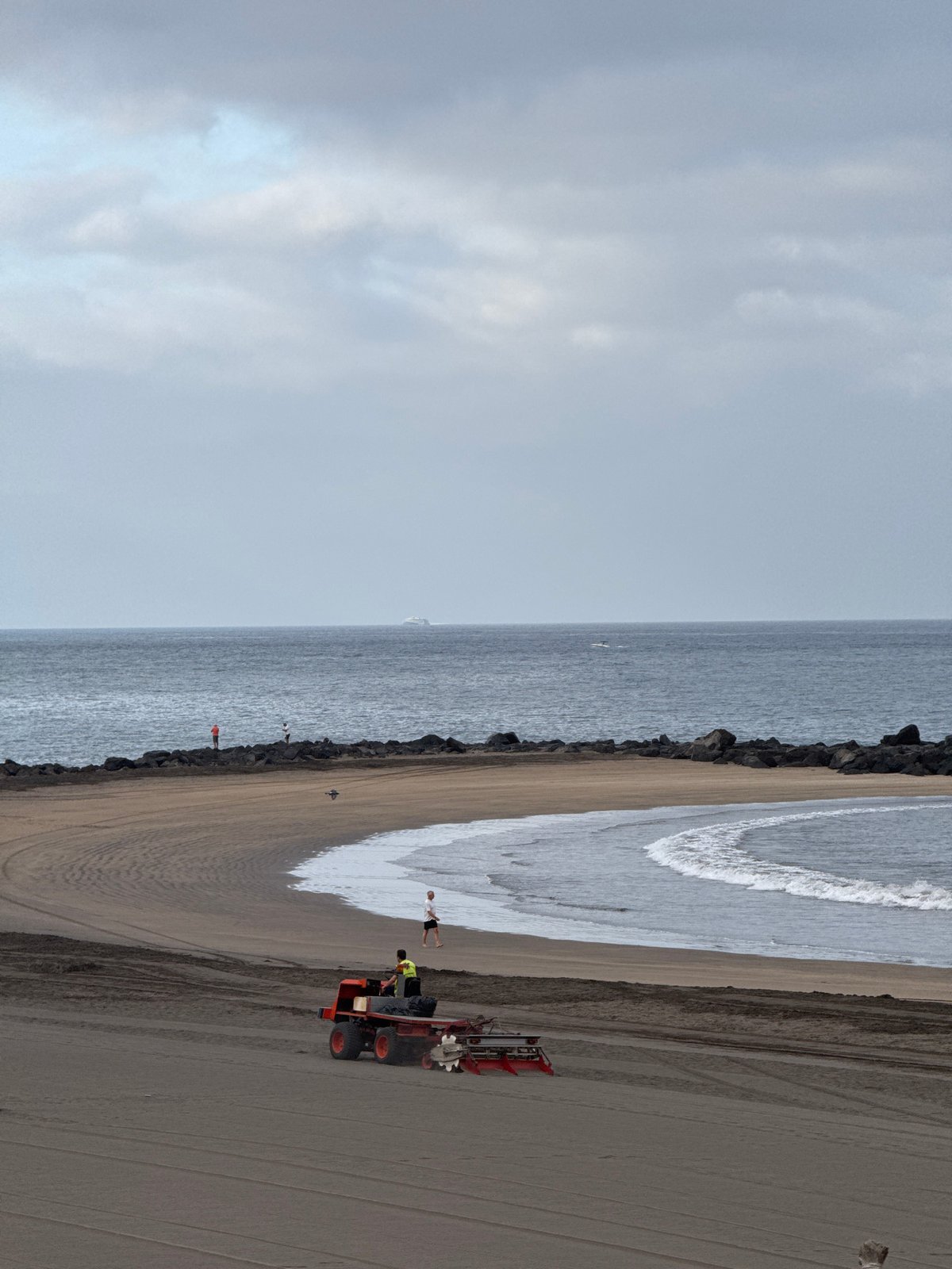 Beach tractor grooming the sand at Costa Adeje