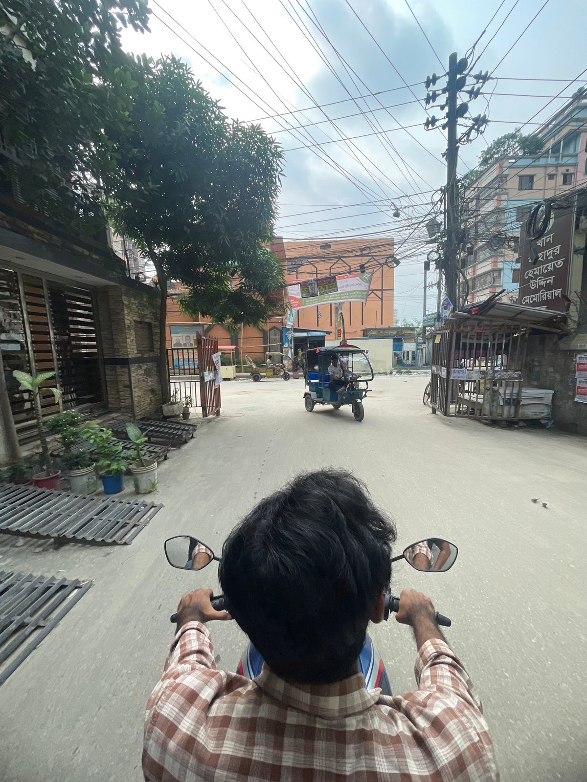 Late night motorcycle ride through Dhaka streets