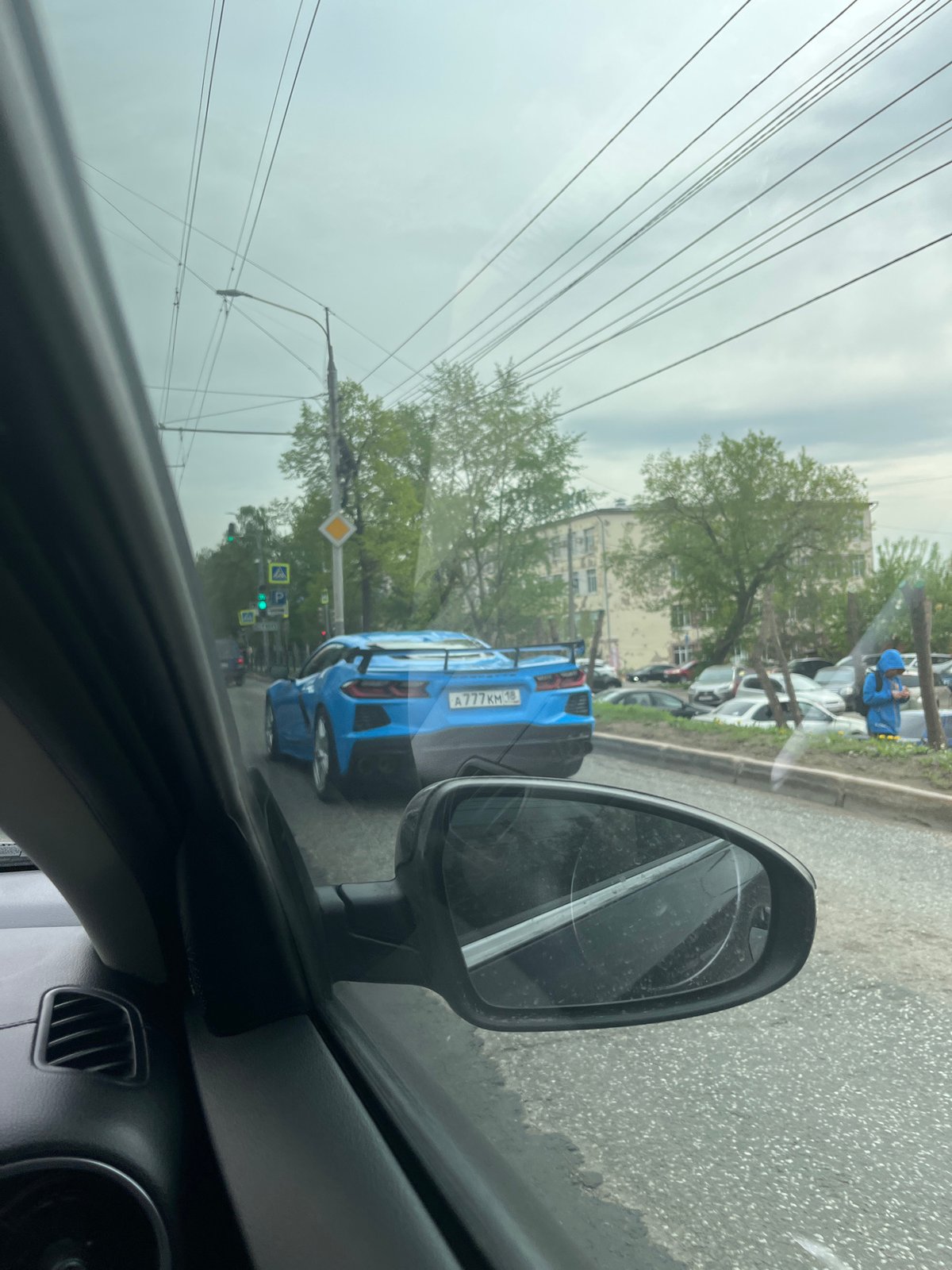 Blue Corvette spotted in traffic near monument in Izhevsk