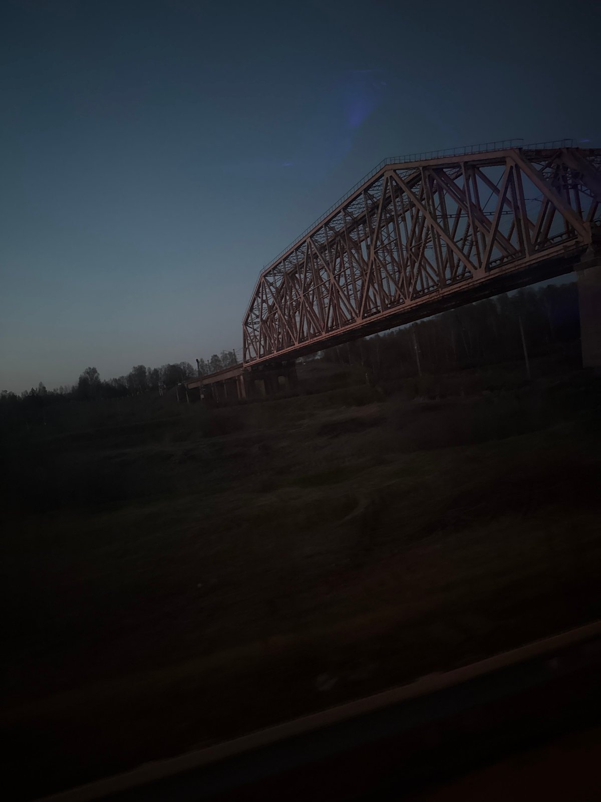 Railway bridge photographed from below in Yakhroma, Russia