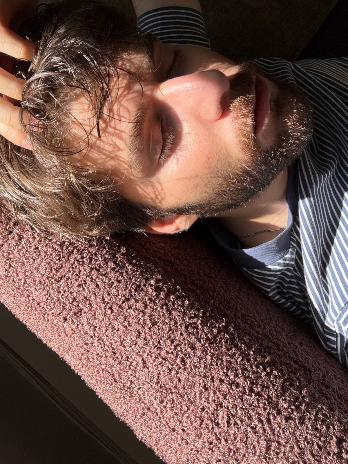 Man photographed in casual evening moments inside Montreal apartment