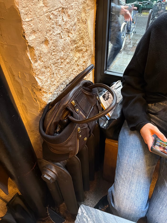 Parisians go about daily routines during rainy afternoon