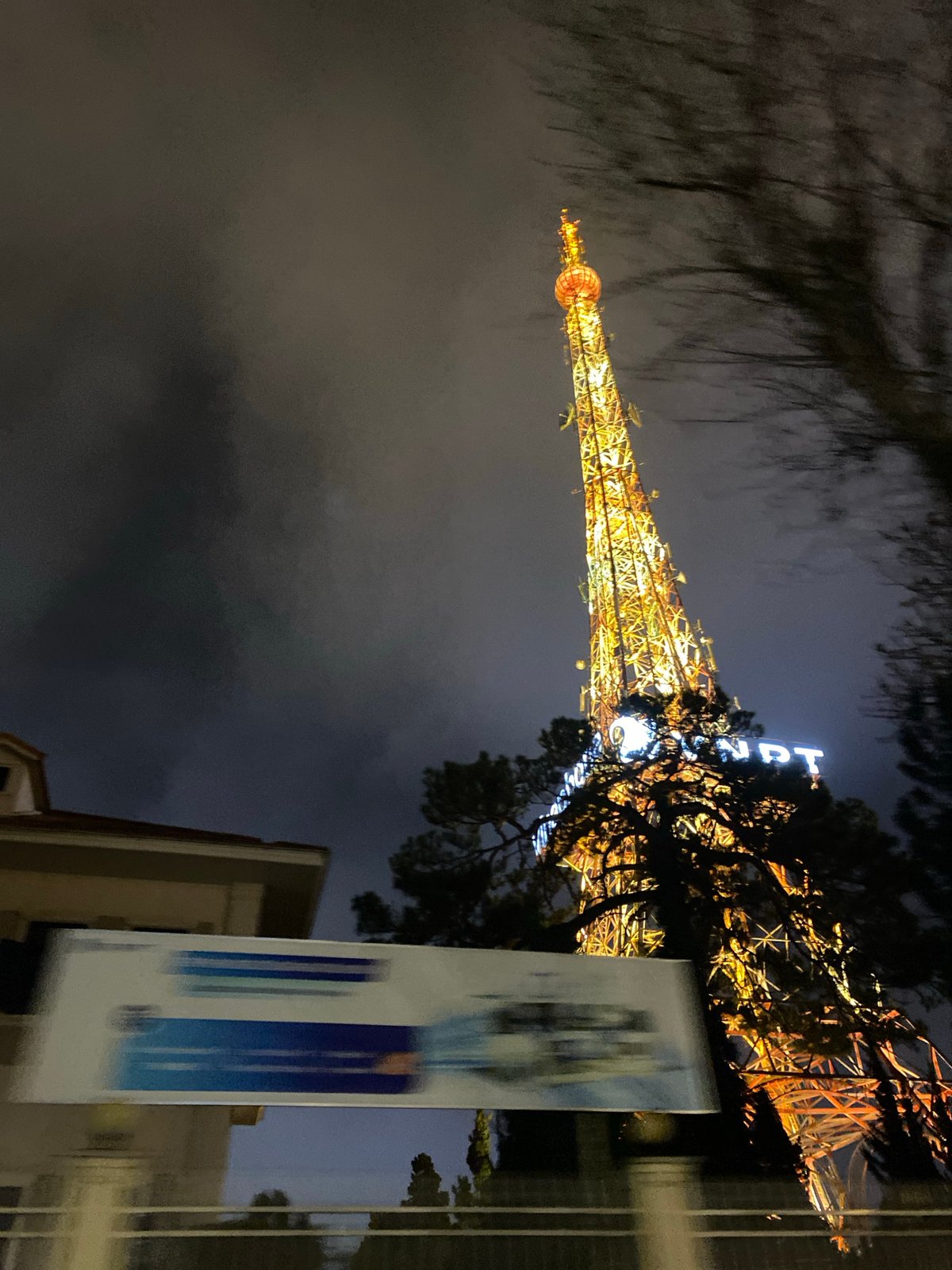 Nighttime scenes captured in Da Lat featuring tower, bustling streets