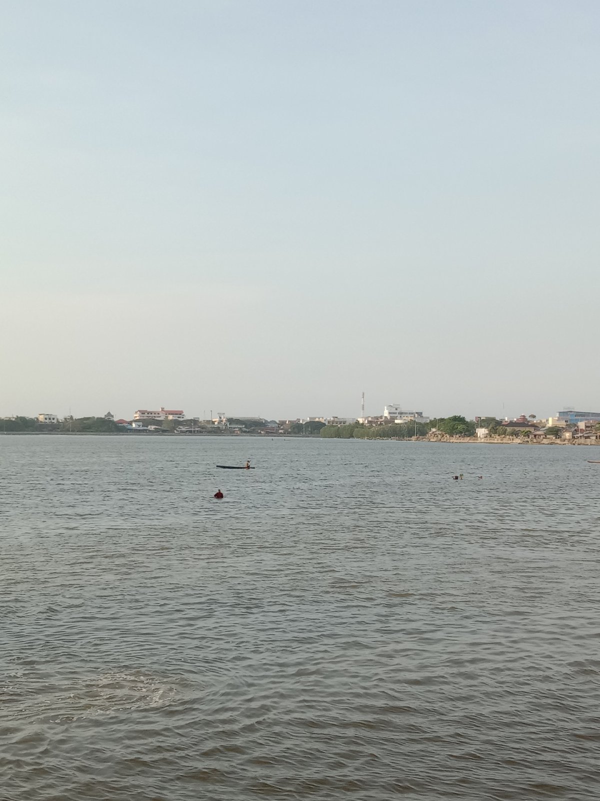 Daily waterfront life documented in Lhokseumawe, Indonesia