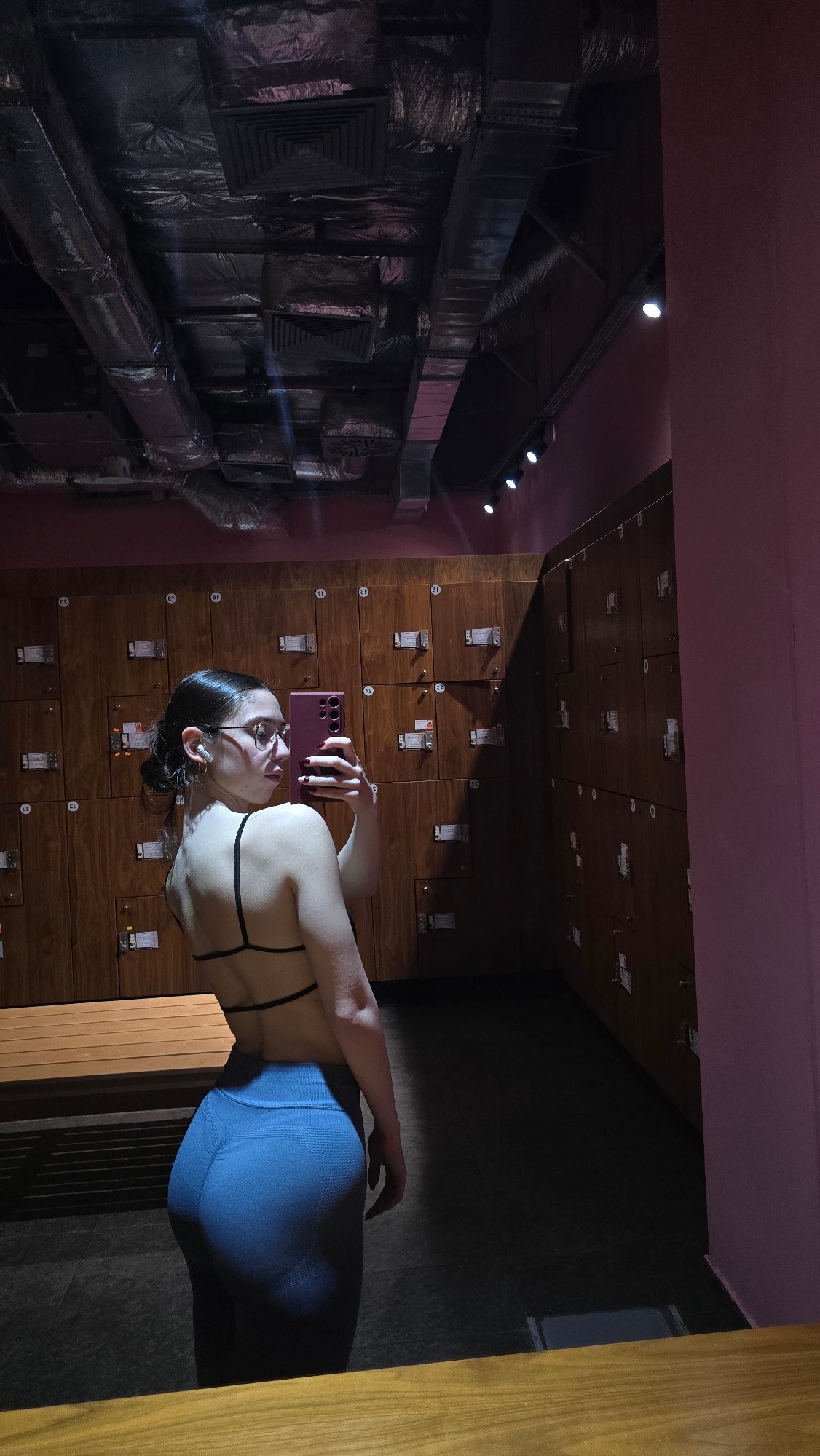 Woman takes selfie in Bulgarian locker room facility